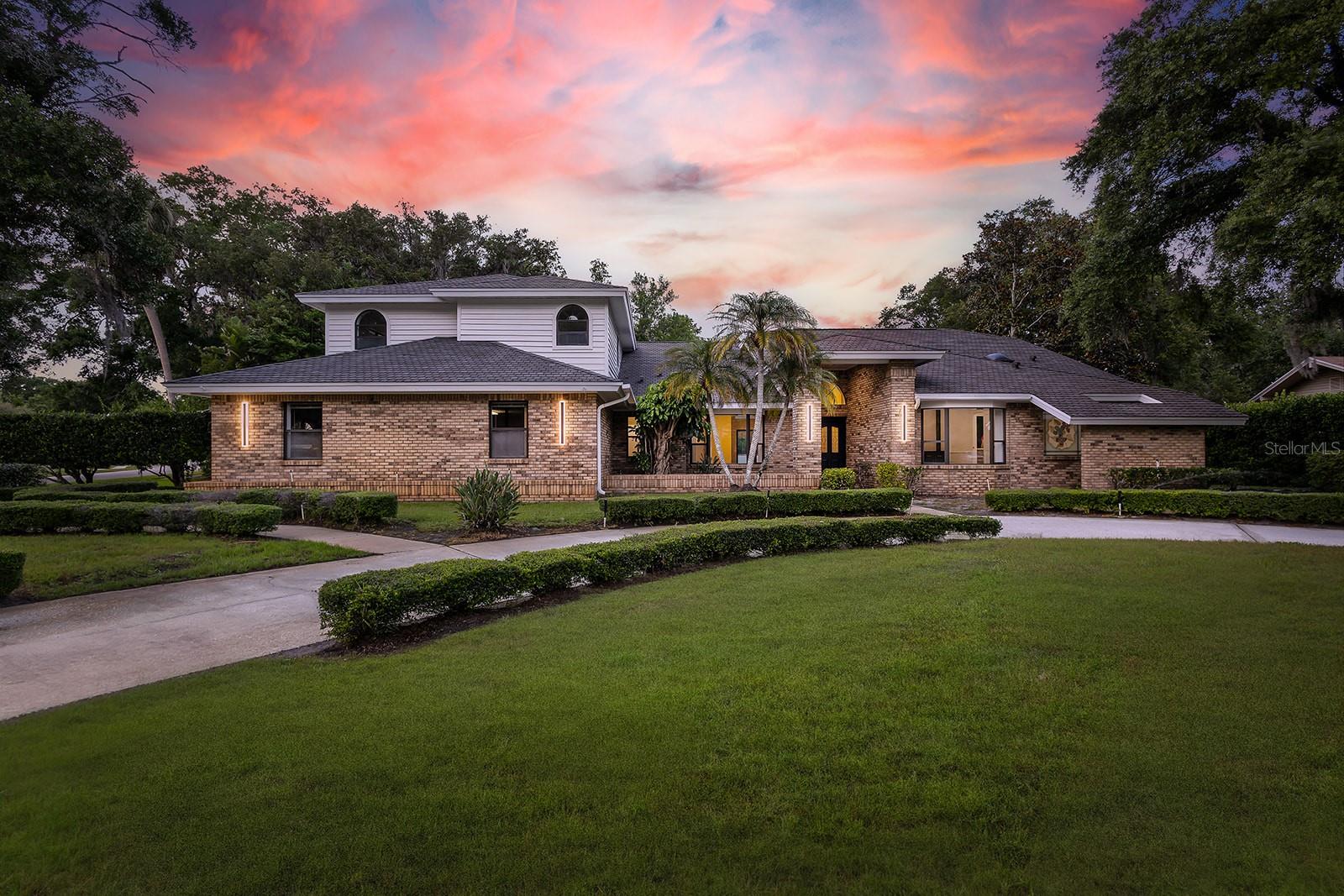 HUGE PRICE IMPROVEMENT !!!!  SELLER MOTIVATED !!!!  Welcome to luxury living in the highly sought-after Cypress Run Golf Community — an exclusive private, gated golf course designed by Larry Packard in the heart of Pinellas County. Cypress Run is an active community that offers tennis, pickleball, golf, and a restaurant and bar. Situated on the largest lot in the neighborhood, this exceptional move in ready 4-bedroom, 5-bathroom custom estate offers over 4,300 square feet (total sq.ft of 6165)of beautifully updated living space on a private 1.26-acre corner lot with breathtaking golf course, pond, and preserve views.

Designed for both comfort and entertaining, this home features soaring vaulted ceilings, a spacious great room, large den, and an open eat-in kitchen. The completely renovated kitchen showcases brand-new soft close cabinetry, designer quartz countertops, two ovens, two sinks, and a full new appliance package.  Luxury vinyl flooring flows throughout the home, with the upstairs bonus room and bedrooms have luxurious thick pile carpet, complemented by fresh interior and exterior paint and beautiful designer lighting.

Each bedroom offers generous space and walk-in closets, providing comfort and privacy for family and guests alike. Step outside to your expansive screened-in pool area featuring an outdoor kitchen and full outdoor bath — the perfect setting for entertaining or enjoying peaceful evenings surrounded by nature and panoramic views.

With its rare oversized homesite, premium golf course location, extensive renovations, and resort-style amenities, this move-in-ready estate is a unique opportunity to own one of the finest properties in Cypress Run and Pinellas County.