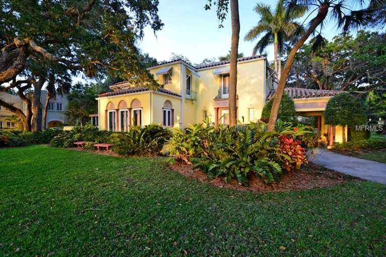 The J.G. and Pearl Whitfield/Taylor home - Embrace history in one of the Crown Jewels of Sarasota overlooking recently refurbished Indian Beach. Nesltled among the majestic live oaks and filled with the soothing breezes off Sarasota Bay, this John Ringling era Mediterranean Revival home is being offered for sale for the first time in 35 years.  Relive the elegance and grandeur of Sarasota's rich past in this historical home listed on the National Register of Historic Places where most rooms provide full views of Sarasota Bay towards Longboat Key.  Built in the 1920's, this Italian style villa is filled with rich architectural detail and exceptional craftmanship.  SOme examples are the hand-carved marble, solid oak floors, Juliet balconies, terraces, screened porches, and walled-in gardens.  The Whitfield home is located in the historic district of Indian Beach minutes to the Ringling Museum, Asolo Theater, downtown Sarasota and Sarasota's beaches and situated to take advantage of the full view of Sarasota Bay.  Picture yourself living in one of the most beautiful homes in Sarasota (as written in the Sarasota Herald Tribune).