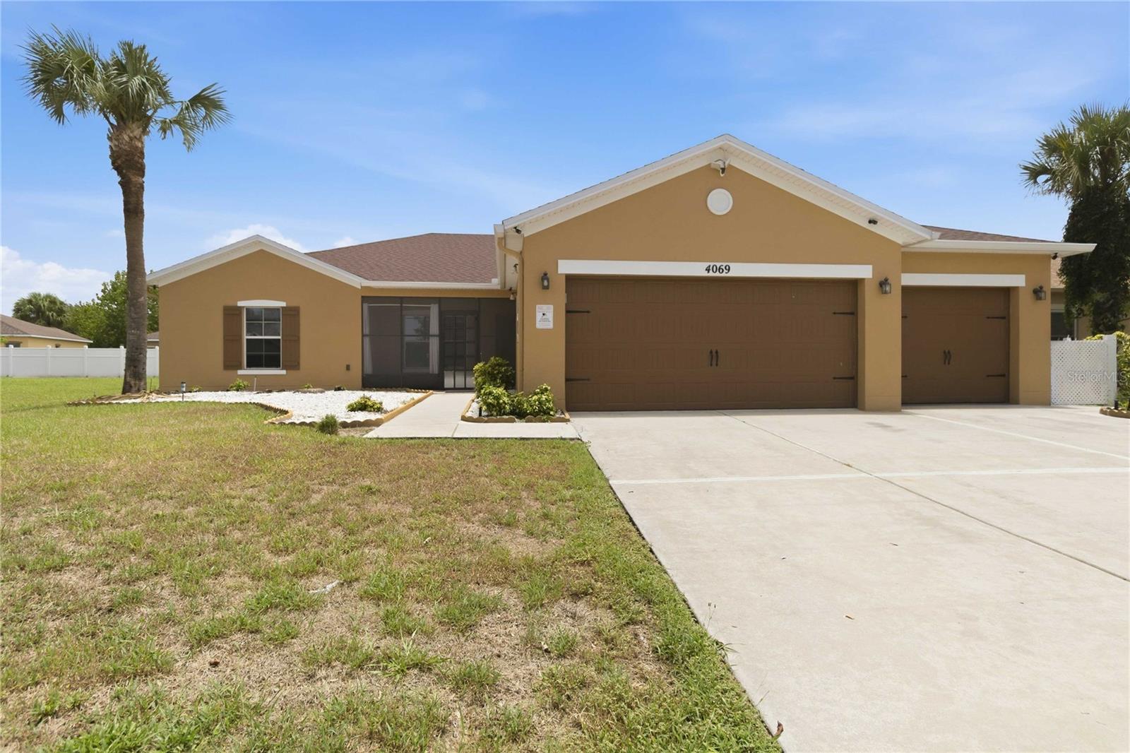 Spacious 4-Bedroom + Bonus Room Home with 3-Car Garage in the Isle of Bellalago Community!

Welcome to 4069 Marina Isle Drive, where comfort, space, and functionality come together in one of Kissimmee's desirable gated communities. This well-maintained home offers 4 spacious bedrooms plus a versatile bonus room that can easily serve as a 5th bedroom, home office, playroom, or media room to fit your lifestyle.

Step inside to discover an inviting open-concept floor plan with high ceilings, abundant natural light, and expansive living spaces perfect for everyday living and entertaining. The kitchen overlooks the main living area and features ample cabinetry, generous counter space, a center island, breakfast bar seating, and stainless steel appliances.

The oversized primary suite provides a peaceful retreat with dual vanities, a walk-in shower, and plenty of closet space. Three additional bedrooms and the flexible bonus room for family, guests, or remote work.

Enjoy Florida living year-round from the covered rear lanai, overlooking a fully fenced oversized backyard with plenty of room for pets, play, or even a future pool. The screened front porch offers another relaxing outdoor space to enjoy your morning coffee or evening breeze.

Additional highlights include:

4 Bedrooms + Bonus Room (Potential 5th Bedroom),
3-Car Garage,
2024 Roof,
Electric tankless water heater,
Open Floor Plan with High Ceilings,
Covered Rear Lanai,
Fully Fenced Oversized Yard,
Screened Front Porch,
Inside Laundry Room,
Move-In Ready,

Located in the Isle of Bellalago community, residents enjoy a welcoming neighborhood atmosphere with convenient access to shopping, dining, schools, major highways, Disney attractions, Orlando International Airport, and everything Central Florida has to offer.

Don't miss the opportunity to make this spacious home your own—schedule your private showing today! Seller Motivated.