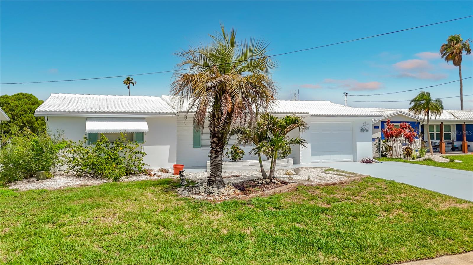 Imagine waking each morning to shimmering water views, the gentle sound of seabirds overhead, and the promise of another beautiful day on Florida's Gulf Coast. This charming waterfront home offers the lifestyle so many dream about but few ever find.

Perfectly situated on a wide saltwater canal with direct Gulf access, your next boating adventure begins right in your backyard. Cast off from your private floating dock and enjoy a leisurely seven-minute idle-speed cruise before reaching the open waters of the Gulf of Mexico. Whether your passion is fishing, island hopping, waterfront dining, or simply watching dolphins play in your wake, this home places it all within easy reach.

The home itself is bright, inviting, and move-in ready. Recently painted inside and out, it radiates pride of ownership and coastal charm. The updated kitchen provides a beautiful and functional space to prepare fresh-caught seafood, or enjoy a quiet breakfast while overlooking the water.

Step outside and discover where this property truly shines. Picture yourself sipping coffee as the sun rises over the canal, watching manatees glide past the dock and pelicans dive for their morning catch. Spend afternoons boating, kayaking, paddleboarding, or simply relaxing as the tropical breeze drifts across the water.

As evening arrives, nature puts on a spectacular show. The nearby wetlands attract an abundance of wildlife, creating a constantly changing waterfront panorama. Egrets, herons, osprey, dolphins, and manatees are frequent visitors. Then, as the day comes to a close, breathtaking sunsets paint the sky in brilliant shades of gold, orange, pink, and purple.

The floating dock and boat davits make it easy to keep your vessel ready for spontaneous sunset cruises and weekend adventures. Every day feels like a vacation when your backyard is your gateway to the Gulf.

This is more than a home—it's a waterfront lifestyle filled with sunshine, boating, wildlife, spectacular sunsets, and the peaceful rhythm of life on the water. Whether you're searching for a full-time residence, a seasonal retreat, or the perfect place to create lasting memories with family and friends, this special property offers an opportunity to embrace the very best of Florida living.

Just minutes from Hudson Beach and within easy driving distance of Fred Howard Park, Clearwater Beach, Honeymoon Island, Fort De Soto, shopping, dining, fishing, boating, cultural attractions, Tampa, and St. Petersburg, this location offers endless opportunities for recreation and enjoyment

Furniture is available separately, allowing you to move in even more easily and begin enjoying the waterfront lifestyle from day one. 

The davits are sold as is and the motors may need servicing. All dimensions are approximate. Home is sold "as is" for the convenience of the seller.

This excellent waterfront value is sure to sell quickly!