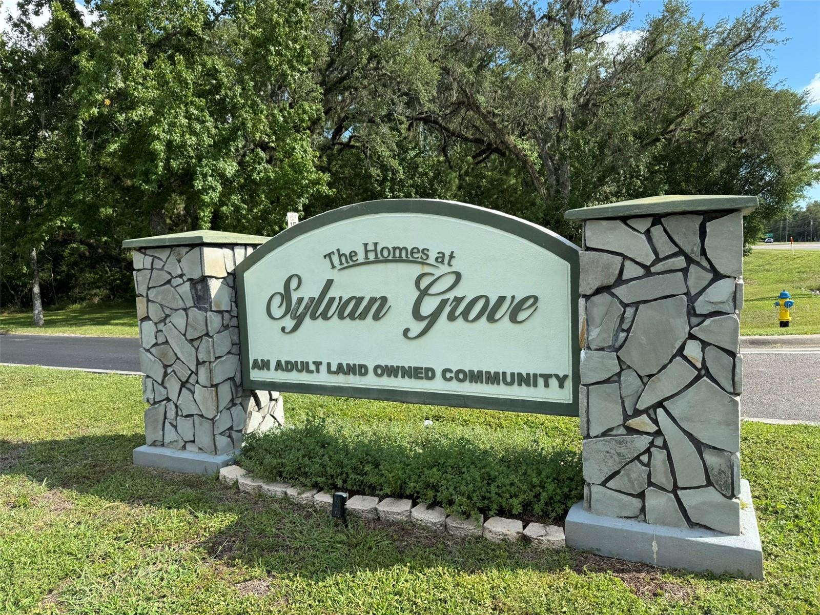 SELLER WILL CONSIDER ALL REASONABLE WRITTEN OFFERS (no owner financing)- Sylvan Grove Vacant Lot Available For Your New Custom Manufactured Home in 55+ Community!  Sylvan Grove Features a Sparkling Inground Community Pool and Clubhouse, and is a Pet Friendly Area About 15 Minutes South of Downtown Brooksville, 45 Minutes North of Tampa Airport, and About 30 Minutes to the Coast.