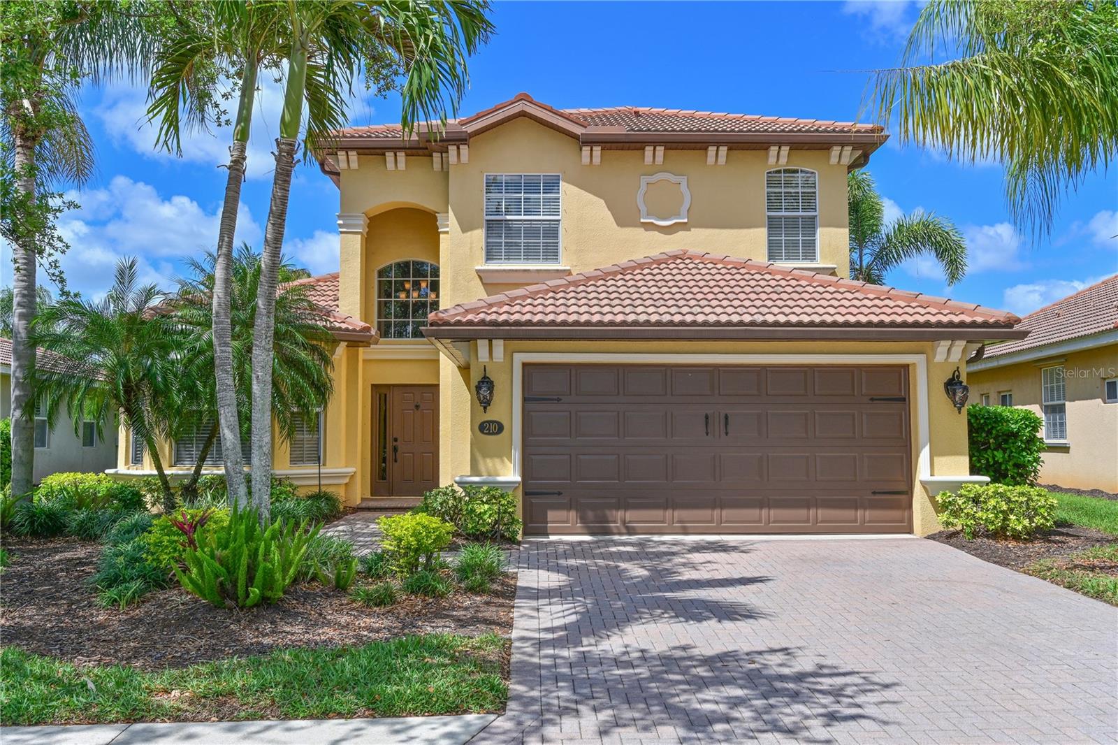 Virtually Staged. New price ! Luxury Golf Living Meets Your Private Backyard Oasis
Experience the ultimate Florida lifestyle in this beautiful, upgraded residence within the prestigious Riverstrand Golf & Country Club. This isn’t just a home; it’s a lifestyle, complete with a deeded golf membership. Inside, the open-concept layout is anchored by a striking custom fireplace, perfectly complemented by elegant ceramic tile and engineered hardwood floors throughout the main level. Updated extended kitchen with custom cabinets, granite counters, and top of the line appliances.
Step through the sliders into your private sanctuary. The massive, extra-large pool deck features a recently resurfaced pool and spa with new waterline tile, and a brand-new heater, ensuring year-round enjoyment. Host unforgettable gatherings at your outdoor kitchen while enjoying the serenity of your surroundings. Upstairs, brand-new carpeting adds a touch of cozy luxury to the private quarters. Located just minutes from I-75, you have the best of Lakewood Ranch, Sarasota, and the Bay Area at your fingertips, with premier shopping like Costco and Target right outside your gates.