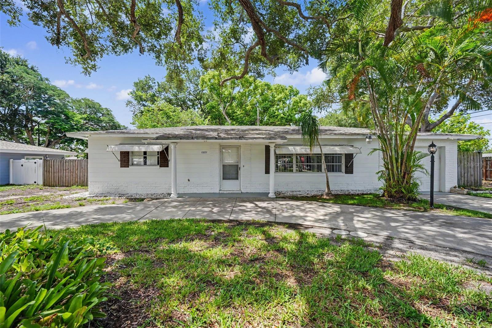 Welcome home to this well-maintained 2-bedroom, 2-bathroom single-family residence a 2026 A/C, and a 2026 water heater ideally located in the heart of Pinellas County! Conveniently situated just off 113th Street, this home offers easy access to Seminole City Center, Largo Mall, movie theaters, popular restaurants, beautiful parks, and the world-renowned Gulf beaches.This solid block home features a spacious and inviting floor plan with a generous living room, perfect for relaxing or entertaining. The kitchen is equipped with a new refrigerator, built-in oven, and cooktop, offering functionality and convenience while providing the perfect opportunity for a new owner to add their own cosmetic touches and make it their own. The room flooring was recently updated, adding a fresh feel throughout the home. The primary and secondary bedrooms offer comfortable living spaces, while the screened-in back porch creates the perfect setting to enjoy Florida's year-round outdoor lifestyle. Step outside to the fully fenced backyard, offering privacy and plenty of room for pets, gardening, or family gatherings. Additional features include an attached one-car garage with washer and dryer hookups for added storage and convenience. Best of all, this property is high and dry with no HOA. Whether you're a first-time homebuyer, downsizing, or searching for a fantastic investment opportunity, this home offers an incredible opportunity for someone looking to personalize it while enjoying an unbeatable central Pinellas County location. Don't miss your chance to own this charming home—schedule your private showing today!