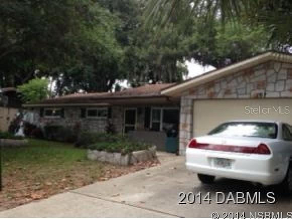 Enjoy this lovely 3 bedroom, 2 bath home in very desirable and established neighborhood of Port Orange. Move in condition includes new paint inside and out, new carpet, updated bathrooms, newer windows, air and roof. Spacious living and family rooms for entertaining. Lush landscaping with private fenced backyard. this is a must on your list! All information recorded in the MLS is intended to be accurate but cannot be guaranteed. CEILING FANS NOT WARRANTED. ;Water: City
