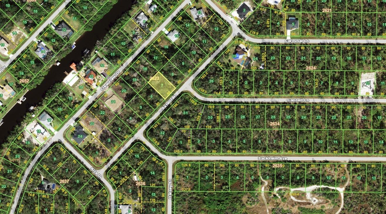 Build your dream home on this desirable homesite located at 1223 Axtel Ter in beautiful Port Charlotte. Nestled in a quiet and growing neighborhood, this property offers the perfect combination of peaceful surroundings and convenient access to everything Southwest Florida has to offer. Enjoy being just minutes from shopping, dining, golf courses, parks, boating, fishing, schools, medical facilities, and stunning Gulf Coast beaches. With continued growth and new construction throughout the area, this lot presents an excellent opportunity for homeowners, seasonal residents, or investors alike. As an added opportunity, the seller also owns 14 additional lots and is willing to negotiate attractive bundle pricing for buyers interested in purchasing multiple properties. Whether you’re looking to build now or invest for the future, this is your chance to secure a piece of paradise in Port Charlotte!