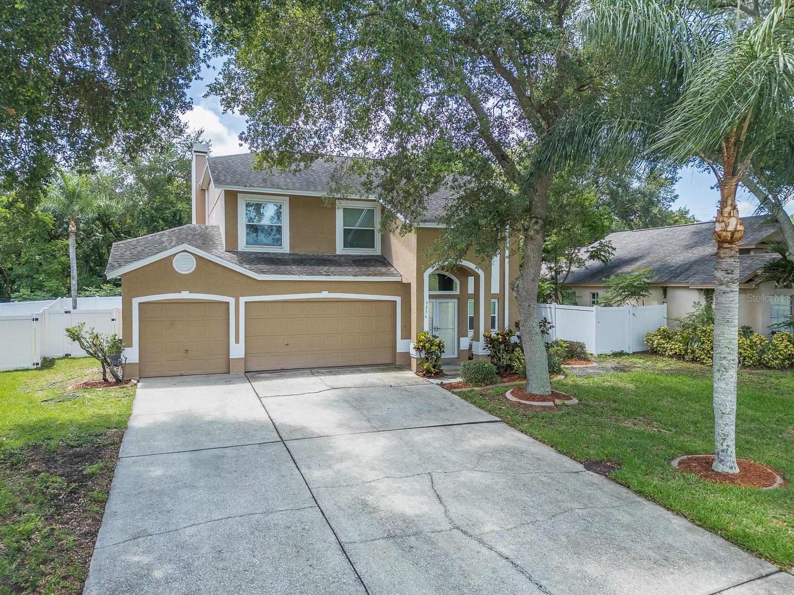 Welcome to 3256 Bentley Drive, a spacious 4-bedroom, 2.5-bath pool home in the highly sought-after Bentley Park community of Palm Harbor. Situated on a premium conservation lot with no rear neighbors, this two-story home offers the perfect combination of privacy, comfort, and functionality. Inside, you'll find soaring ceilings, abundant natural light, generous living and dining spaces, and a versatile floor plan designed for both everyday living and entertaining with a conveniently located half bathroom for guests. The oversized primary suite features a walk-in closet and spacious en-suite bath, while three additional bedrooms provide plenty of room for family, guests, or a home office. Step outside to your private backyard retreat complete with a sparkling pool and spa, fully fenced yard, and peaceful conservation views. This well-maintained home has been thoughtfully updated with a new stove and dishwasher (2025), pool pump (2025), front door and storm door (2022), and fencing (2021). Additional highlights include a 3-car garage and a convenient location near two major airports and near top-rated schools, top  rated hospitals, parks, shopping, dining, golf courses, and the Gulf beaches. Don't miss this opportunity to own a beautifully maintained home in one of Palm Harbor's most sought-after communities.