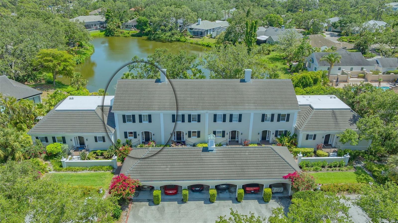 **EXPERIENCE EFFORTLESS LIVING in this BEAUTIFULLY UPDATED TOWNHOUSE with SERENE WATER VIEWS**  Located behind the Secure Gates of The Oaks Preserve, Golf & Country Club neighborhood, this delightful residence features 2 En Suite Bedrooms on the 2nd Floor, 2 Full and 1 Half Baths, and offers a refined yet relaxed lifestyle surrounded by mature oak canopies and tranquil lake views.  The main living area entails an inviting great room that opens to serene water views framed by palms and natural greenery while the European-style kitchen is thoughtfully designed with premium SubZero, Wolf and Bosch appliances, modern wood cabinetry, polished granite countertops, and durable ceramic tile flooring—ideal for both everyday living and entertaining.  Architectural details add warmth and character throughout, including hand-plastered walls with art niches, graceful archways, plantation shutters, and sisal carpeting. Just off the entry foyer, you’ll find a convenient powder room and a separate laundry room. A private brick balcony provides ample space for outdoor dining or relaxing while enjoying the peaceful surroundings.  The primary suite overlooks the lake and includes two walk-in closets and a spacious bathroom featuring dual vanities, walk-in shower, jacuzzi tub and appointed with upscale finishes. The guest suite is equally comfortable, complete with built-in shelving and ample storage.  THE OAKS is a distinguished, 24hr Guarded, Country Club Community which boasts many accolades including: Platinum Club of America, Emerald Club of the World, Elite Distinguished Club of the World and One of America’s Healthiest Clubs - where amenities include Three Restaurants, Ballroom, Two 18-hole championship GOLF courses, award-winning RACQUETS program with 12 Har-Tru Hydro-Grid TENNIS courts (4 lighted), 4 PICKLEBALL Courts, wonderful CROQUET facility, state-of-the-art FITNESS center and junior Olympic, heated community SWIMMING POOL, Bocce, Basketball Court, Playground and more! The Oaks is just minutes from nationally ranked Pine View School, the Legacy Bike Trail, area Beaches and all that Gulf Coast living has to offer. Membership is required and there is NO WAITLIST for GOLF or SOCIAL Membership.