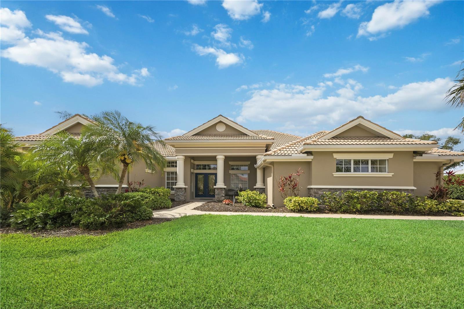 Virtually Staged. Welcome to one of the largest homes in the gated community of Heron Creek Golf and Country Club, which is the most sought out neighborhood in North Port.

This 6-bedroom 4 bath gem has a golf course view without being on a cart path, and a view of a beautiful pond with a fountain. Plenty of palm trees give this home a beautiful Florida feel to it. It is a perfect home for entertaining or for those who have a large family.

The oversized master suite connects to the outside pool. The master bath has two sinks, a large soaking tub, a separate commode area, and a Roman shower.

There is a large study just outside the Master suite and just inside the front door.

The main level has a living room, dining room and family room with a gas fireplace for cooler winter days.

There are three other bedrooms on the main level, including an in-law suite with a private bath, separate sitting room, and a separate entrance into the bath for pool use.

There are two large bedrooms on the second level with a private bath. One of the bedrooms has a walk-in closet.

There is a large gourmet kitchen with a large island and breakfast bar with seating for six, plus space for a kitchen table. The oven and microwave are brand new. The dishwasher and garbage disposal were replaced in 2025.

It has a large, heated pool with a built-in spa. It also has built-in bar with a sink and space for a small refrigerator and grill. The pool filter and heater are virtually new; installed in 2025. The pool cage is hurricane grade including the screens.

It has a three-car garage, and with the single door garage usable for a golf cart, which is allowed in this community. Moreover, the garage is finished with a built-in work bench, utility sink, closets and cabinets. There is ample storage.

It has been freshly painted inside and out, including the pool deck, driveway, and walkways.

There is a sound system throughout the house.

There are hurricane shutters that convey,

New hot water heater and near new HVAC systems. Ducts were cleaned 2025. New carpets.

Heron Creek Towne Center is just outside the White Ibis Drive gate, which has a Publix, a UPS Store, a gym, restaurants and other stores for your convenience.