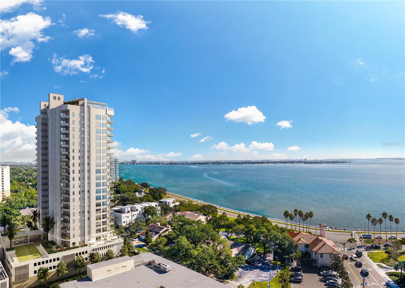 Welcome to Altura Bayshore, an unprecedented new condominium living experience with unrivaled amenities rising above Bayshore Boulevard. This 3 Bedroom plus Den, 3.5 Bath residence boasts 2896 square feet with front to back sunrise and sunset views from private terraces. Every Altura residence features a private elevator foyer.  With floor to ceiling glass and 10’ ceilings, the open floor plans are filled with natural light. Gourmet kitchens feature an expansive island with quartz countertops, array of cabinet finishes, and Thermador WIFI enabled stainless steel appliances plus 92-bottle capacity wine chiller and gas range. The Owner's Suite has direct Bay views, terrace access, spacious walk-in closet and spa-like bath. Offering two expansive amenity decks, the rooftop features a large pool with lap lane and sun shelf, cabanas and lounges, private club room with gas fireplace, casual seating, large bar, and flat screen tv’s for the ultimate entertaining experience. On our 4th floor enjoy a fitness center with Bay views, putting green, firepit, outdoor pickleball, half-court basketball, and bocce courts plus a dedicated dog park with shade pavilion. Other key features include 24-hour front desk, 2 reserved parking spaces with optional electric car charging station, and storage space in a secured garage. Altura Bayshore will soon set the standard for luxury, maintenance-free living in this prime South Tampa location, central to all the best entertainment and restaurants in Tampa. Whether it’s a stroll along the Bayshore Trail, an art show in Hyde Park Village, a night on South Howard Avenue or one of many other choices, your favorite adventure is always close by.