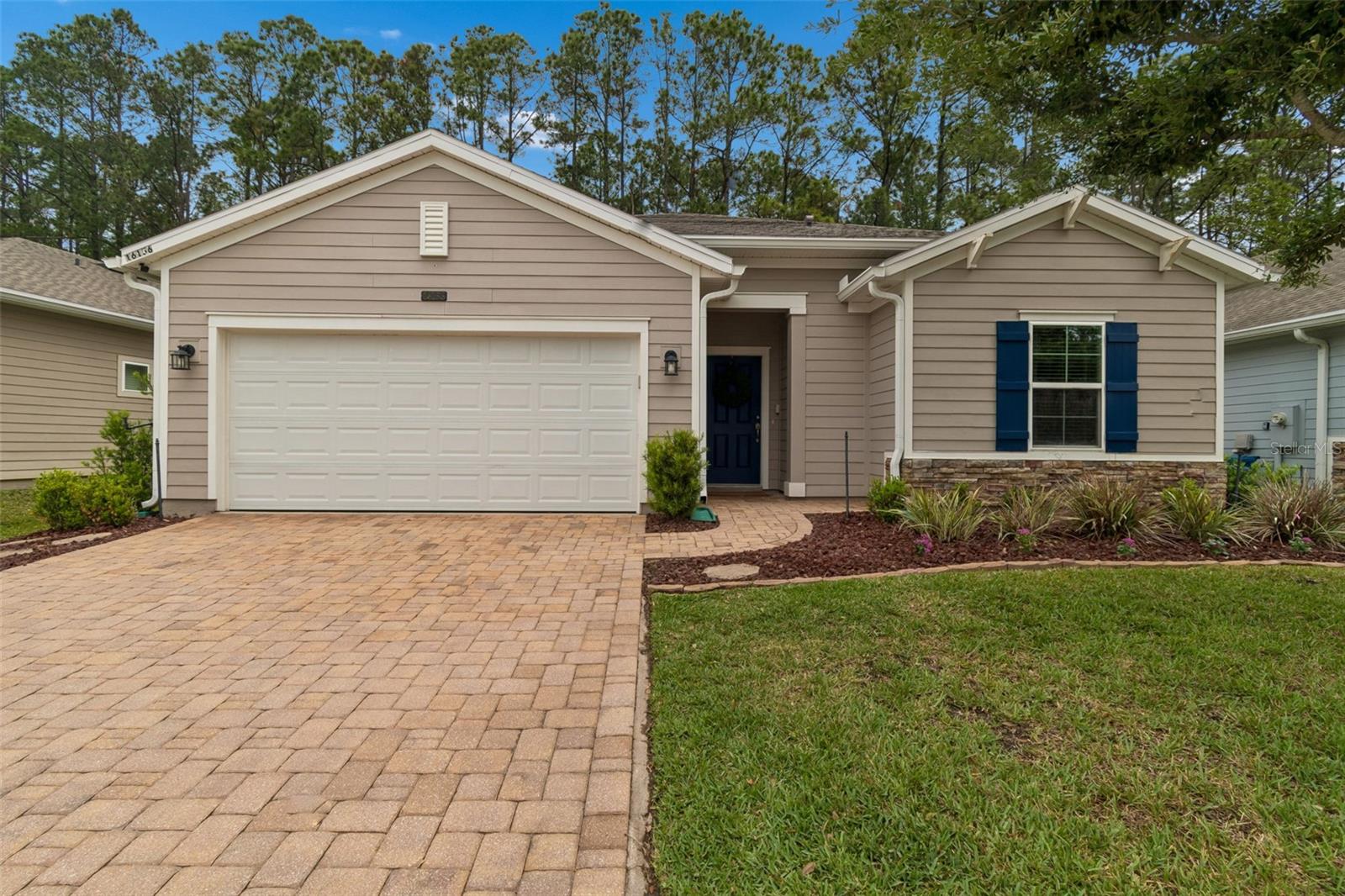 Welcome to this beautifully upgraded 3-bedroom, 2-bathroom home in the highly desirable Bainebridge Estates community, offering modern design, energy efficiency, and peaceful views of nature. This move-in-ready home delivers the perfect blend of functionality, style, and Florida lifestyle living, making it ideal for primary homeowners, relocations, or investment buyers searching for a turnkey property near Jacksonville.

Step inside to discover an open-concept floor plan with 9-foot ceilings, abundant natural light, and durable ceramic tile flooring throughout the main living areas. The spacious layout is anchored by a gourmet kitchen featuring granite countertops, 42-inch cabinetry, stainless steel appliances, a large center island, and ample prep space—perfect for entertaining, meal prep, and everyday living. The kitchen flows seamlessly into the expansive family room, creating a true open living experience that today’s buyers demand.

The split-bedroom floor plan provides privacy and flexibility, with two generously sized secondary bedrooms positioned at the front of the home and a luxurious primary suite tucked away in the rear. The owner’s retreat features a large walk-in closet, dual vanities, and a spacious walk-in shower, creating a spa-like environment designed for comfort and relaxation. Additional storage is abundant throughout the home, including multiple walk-in closets, a linen closet, and a walk-in pantry.

Outdoor living is where this home truly shines. Enjoy year-round relaxation on the covered and screened lanai overlooking a fully fenced backyard with tranquil views—no rear neighbors, just privacy and nature. Whether you’re hosting guests, enjoying morning coffee, or unwinding at sunset, this outdoor space delivers the Florida lifestyle buyers are searching for. The paver driveway and two-car garage add curb appeal and convenience.

Located in Bainebridge Estates, residents enjoy resort-style amenities including a community pool, fitness center, and playgrounds, all within close proximity to I-95, I-295, Jacksonville International Airport, River City Marketplace, downtown Jacksonville, and top shopping and dining destinations. This location is ideal for commuters and those seeking easy access to everything Northeast Florida has to offer.
Key features include: open floor plan, split-bedroom layout, granite countertops, crown molding, stainless steel appliances, large kitchen island, 42” cabinets, screened paver lanai, fully fenced yard, no back yard neighbors, walk-in closets, 9’ ceilings, insulated windows, paver driveway, energy-efficient construction, and move-in-ready condition. Freshly painted, newer carpet, upgraded landscaping, epoxy finished garage floors.

If you’re searching for a modern, upgraded home with privacy, space, and convenience in one of Jacksonville’s fastest-growing areas, this is a must-see opportunity.
