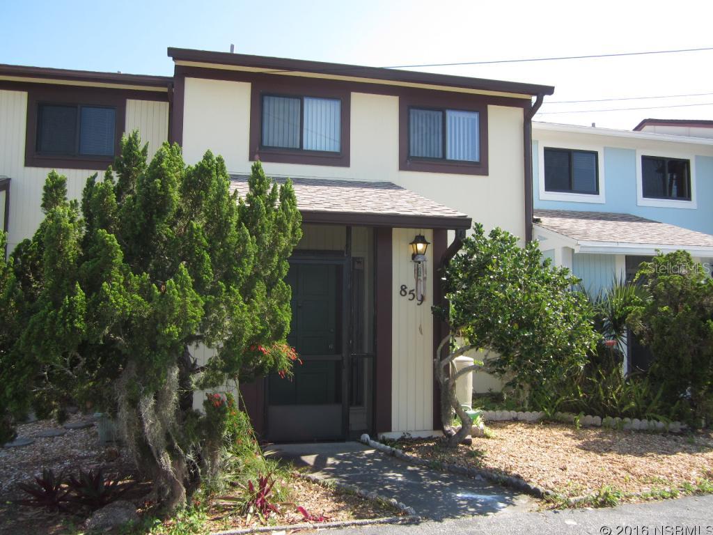 BEACHSIDE TOWNHOME Located Close to the Beach & River!2 Story Townhome with large Patio and Tropical Back Yard. New Kitchen Cabinets, Counter Tops & New Flooring. Light & Bright and Freshly Painted. 2 Bedrooms 1.5 Baths. Washer/Dryer hook up In Unit. Move In Ready! Close to Elementary School, Church, Restaurants & Shops. Great Opportunity to Own & Live Beachside! ;Water: City