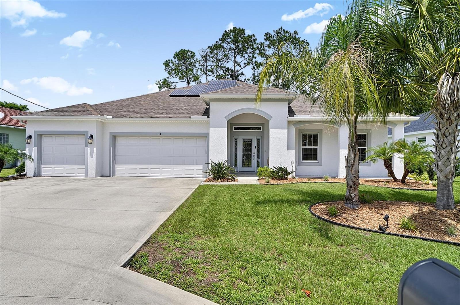 Welcome to your waterfront dream home in Palm Coast. Built in 2021 by Holiday Builders, this beautifully designed 3-bedroom, 2.5-bath residence offers over 2,700 square feet of thoughtfully crafted living space on a wide freshwater canal.

From the moment you enter, you’ll appreciate the spacious open layout, soaring ceilings, and quality finishes throughout. This home features a private office, ideal for working from home, plus oversized bedrooms that provide exceptional comfort and flexibility.

At the heart of the home is a stunning gourmet kitchen featuring beautiful Ubatuba Granite countertops, abundant cabinetry, and generous prep space—perfect for entertaining or everyday living. Matching Ubatuba Granite countertops continue in the bathrooms, creating a cohesive and elevated design throughout the home.

Ceramic tile flooring flows throughout the main living areas and primary suite, with carpet in the two guest bedrooms for added comfort. Large rooms and an intelligent layout create a spacious yet welcoming feel.

Step outside to enjoy peaceful canal views from the extended covered lanai, the perfect spot for morning coffee, evening relaxation, or entertaining guests. The fenced backyard offers privacy and plenty of room for pets, play, or future outdoor enhancements, like a pool. 

Additional upgrades include solar panels for improved energy efficiency and reduced utility costs, along with a UV water filtration system that provides enhanced water quality and peace of mind.

Complete with a desirable 3-car garage and ideally located in one of Palm Coast’s sought-after freshwater canal neighborhoods, this exceptional home offers the perfect blend of modern construction, energy efficiency, spacious living, and waterfront beauty.
