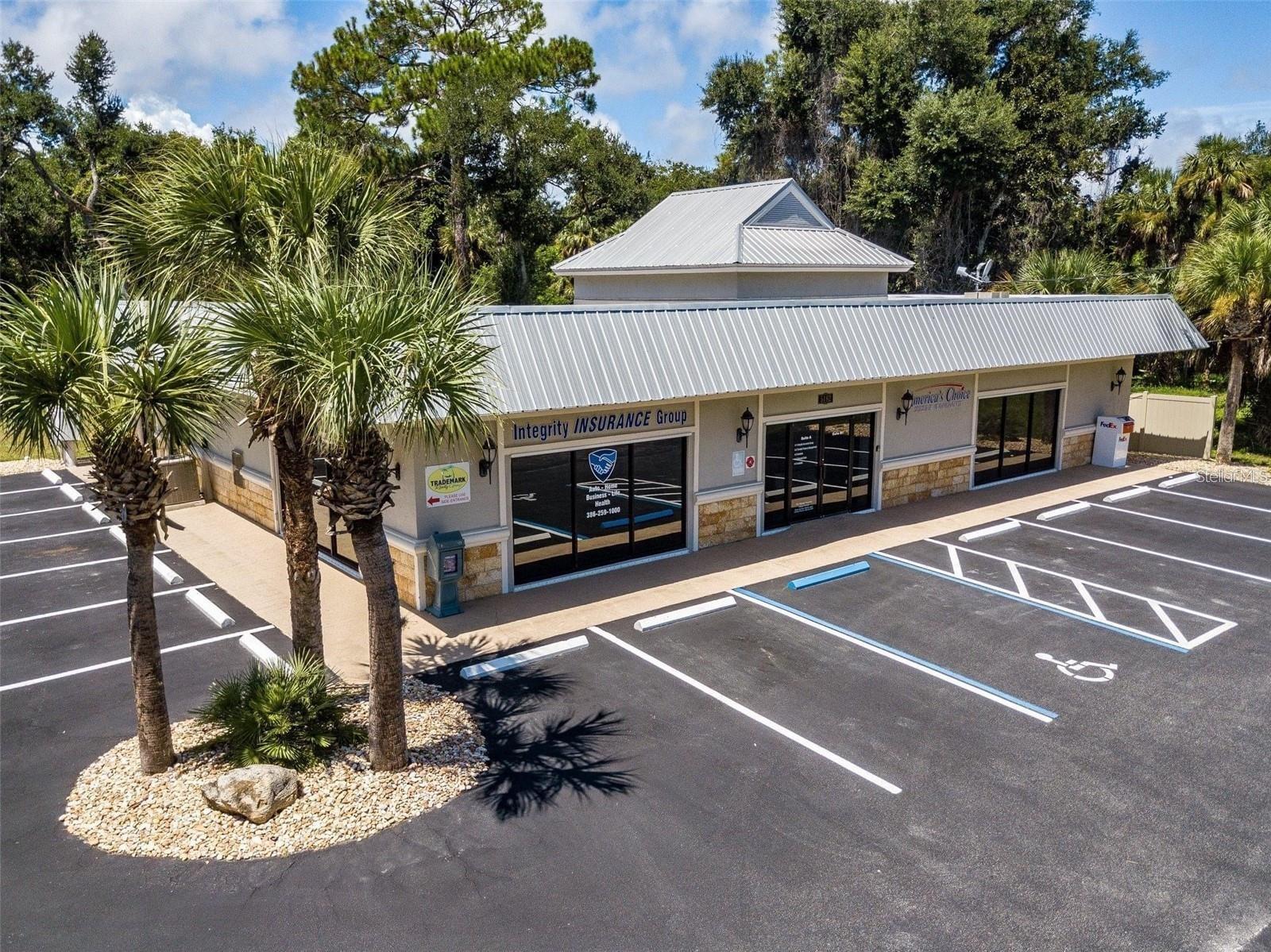 Hammock Business Center building in the Hammock fronting Ocean Shore Blvd/A1A. There are a total of 8 office spaces. UNIT A-2 IS CURRENTLY AVAILABLE for $800.00 a month. Monthly Rent will Include Electric, Water, Sewer, Trash, and internet. Ample parking space that has been repaved and relined. New, vinyl fence erected around the perimeter of the property and landscaping has been updated and maintained. Looking for tenants who would like a wonderful space with fantastic landlords who maintain their building and take pride in its appearance. Close proximity to restaurants, gas stations, and Publix. Current tenants include a locally owned real estate company, title insurance company, insurance company, property management company, mortgage broker, and a facialist/aesthetician.