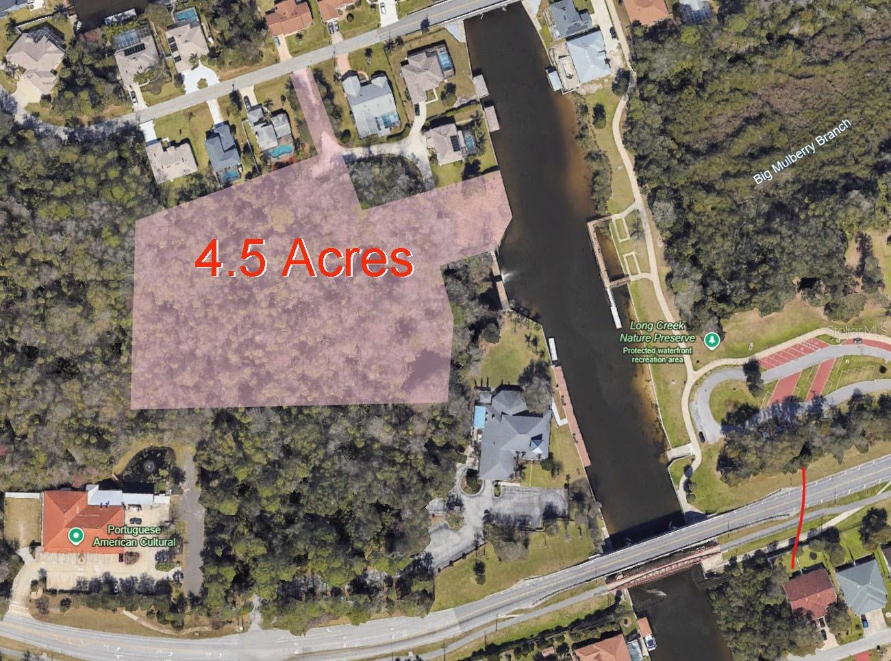 Welcome to 34 Colechester Lane, a stunning piece of land located in Palm Coast, FL. Exceptional location in the heart of Palm Coast. Set on 4.5 acres of pristine land, this unique property includes a 14,000 sq. ft. constructible lot, already bulkheaded and offering 125 feet of frontage on a no-wake, wide saltwater canal leading to the intra costal. No time limit to build your dream house. The Eastern exposure is ideal for a future dock, pool, and serene morning sunrises. Located at the end of a quiet cul-de-sac, the setting is remarkable and unique with no other property of that size available for sale in the heart of palm coast. A City nature park lies directly in front (long creek nature preserve) (East), ensuring permanent natural views with no frontal neighbor. River with a small cascade along one side (South) and Four acres of protected centennial forest at the rear (West), with a river winding through it. Wildlife is abundant—deer, fish, and otters are frequent visitors—creating a peaceful, private, and truly unique environment. Enjoy easy access to local amenities, shopping, dining, and entertainment in a two mile radius,