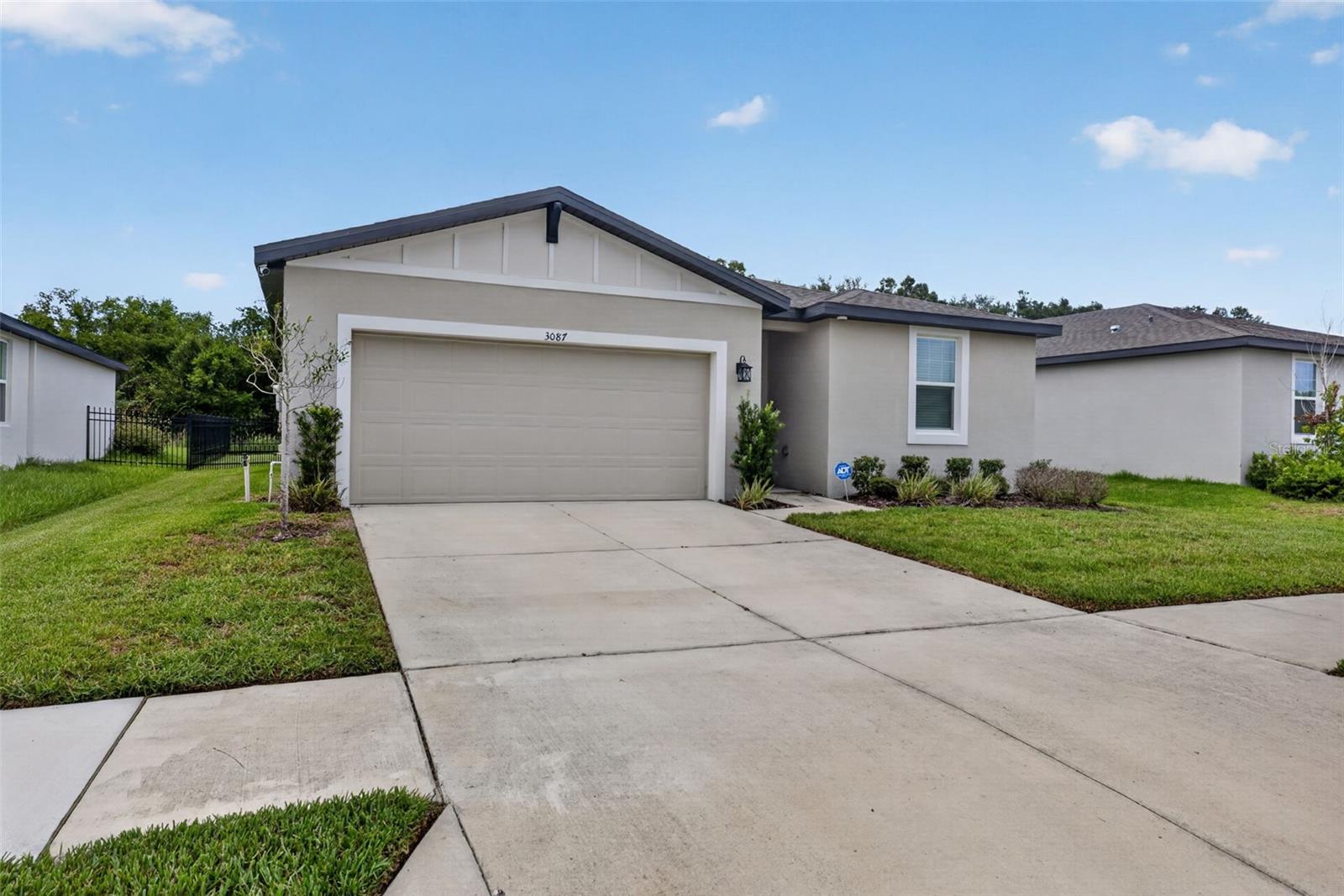 Welcome to this inviting home located in the newer Bristol Meadows community of Zephyrhills, offering modern comfort, a thoughtful layout, and a peaceful neighborhood feel. Built in 2023, this home offers 1,506 square feet of living space with an open and welcoming design made for easy everyday living. The main living areas flow naturally together, creating a bright and comfortable space for relaxing, gathering, or entertaining. The kitchen serves as the heart of the home with plenty of workspace and an easy connection to the dining and living areas. Comfortable bedrooms and two full bathrooms provide a practical layout, while the primary suite offers a private place to unwind at the end of the day. An attached two-car garage adds everyday convenience and additional storage. Property records and prior listing data identify the home as a 2023 build with approximately 1,506 square feet and two bathrooms. Located in Bristol Meadows, this home offers the charm of a growing residential community while keeping you conveniently connected to shopping, dining, and everyday necessities throughout Zephyrhills. Whether you're looking for a place to settle in and make your own or a newer home with rental potential, this property offers comfort, convenience, and flexibility. Schedule your showing today!