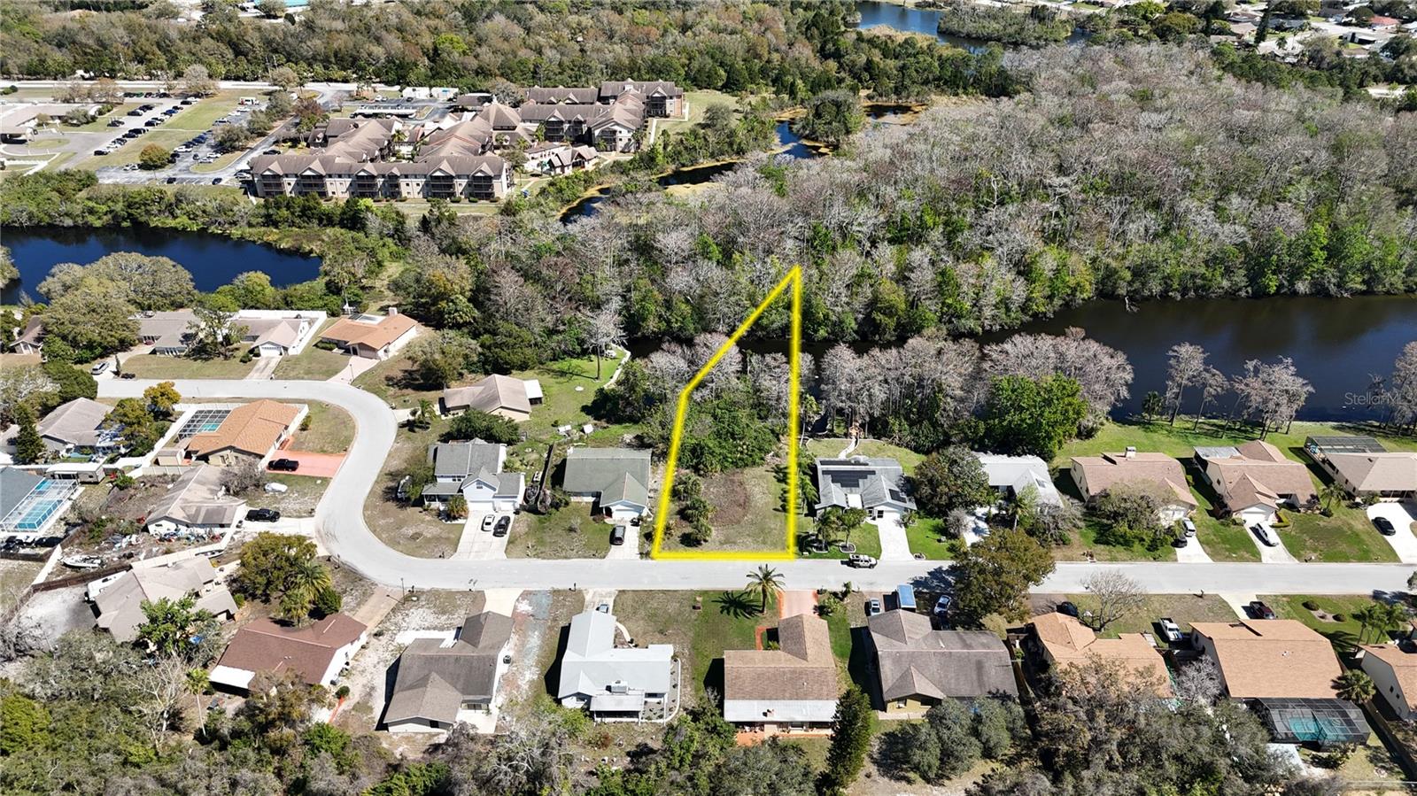 Serene Waterfront Homesite on a Chain of Freshwater Ponds – Near the Gulf Coast
Discover the perfect setting for your dream home on this cute residential homesite, nestled along a scenic chain of freshwater ponds in an established Florida neighborhood. Offering tranquil water views, this unique property provides the ideal balance of nature, and accessibility. Waterfront Location allows direct access to a series of picturesque freshwater ponds, perfect for fishing, kayaking, and birdwatching. Ample space to build your custom home, with room for outdoor living, a private dock, or lush landscaping. Just minutes from the Gulf Coast, offering easy access to white sandy beaches, boating, and vibrant seaside communities. Utilities ready, essential utilities available are nearby for hassle-free development. Whether you’re looking for a full-time residence, vacation getaway, or investment opportunity, this waterfront homesite offers the best of both worlds—freshwater tranquility with coastal excitement just around the corner.
Don’t miss this rare opportunity to own a slice of paradise! Call today for more details or to schedule a viewing.