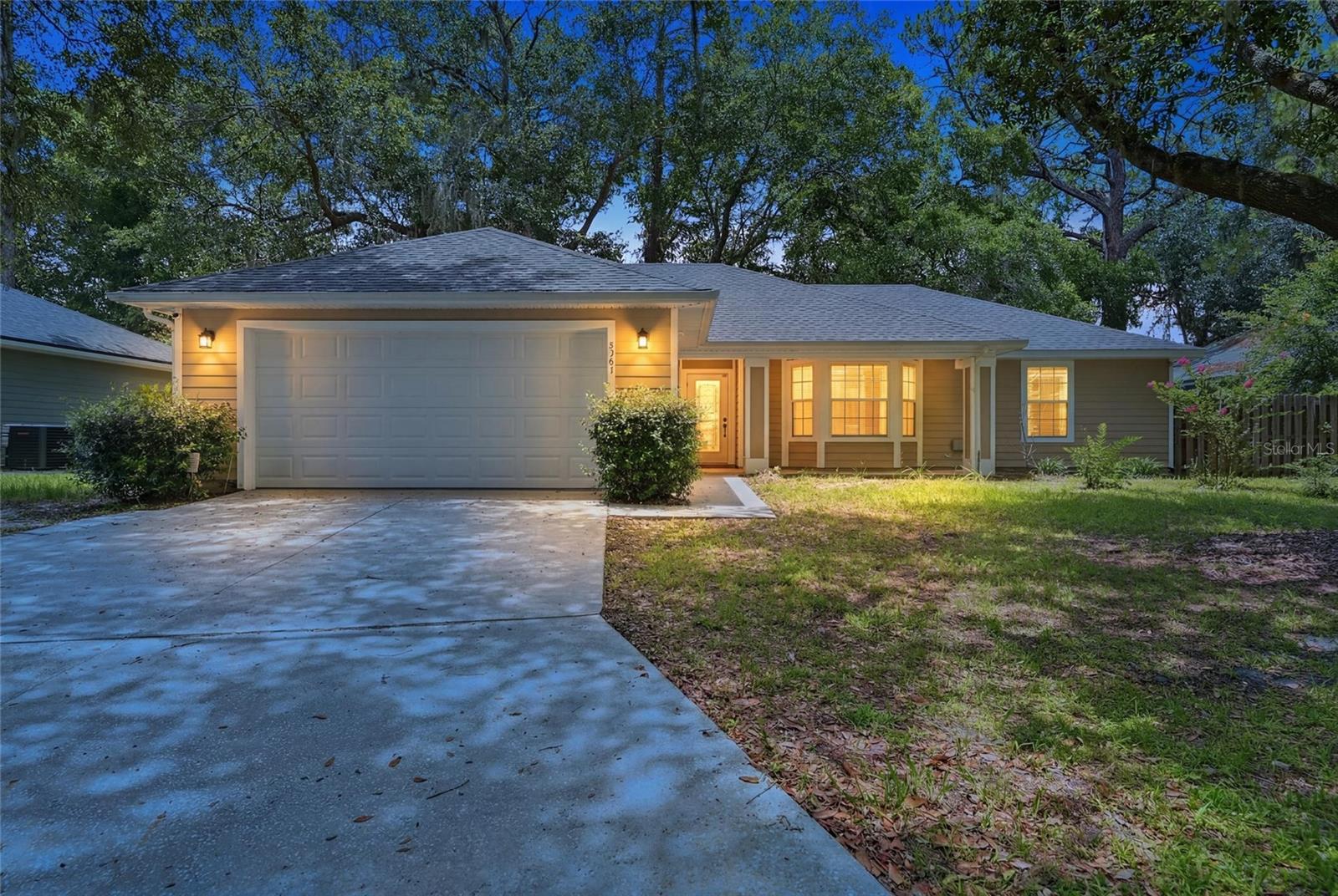 Welcome to this beautifully maintained 3-bedroom, 2-bath home in the desirable Capri community of Northwest Gainesville. Built in 2001, this 1,430-square-foot home features a desirable split-bedroom floor plan with soaring vaulted ceilings and an abundance of natural light, creating a spacious and inviting atmosphere.
The open-concept living and dining areas provide the perfect space for entertaining or everyday living. The home offers updated bathrooms, durable hard-surface flooring throughout with no carpet, and a generously sized primary suite designed for comfort and relaxation.
Step outside to a fully fenced backyard where you'll find a covered, screened patio, ideal for enjoying Florida evenings, hosting family and friends, or simply unwinding in privacy. Major updates provide added peace of mind, including a 2022 roof, 2022 HVAC system, and 2020 water heater.
Located on a quiet cul-de-sac in the established Capri neighborhood, residents enjoy access to community amenities including a pool, clubhouse, tennis courts, basketball court, and neighborhood events. Conveniently situated just minutes from the University of Florida, UF Health, North Florida Regional Medical Center, shopping, dining, and major roadways, this home offers the perfect blend of comfort, convenience, and community.

Don't miss your opportunity to own this move-in-ready Northwest Gainesville home. Schedule your private showing today!