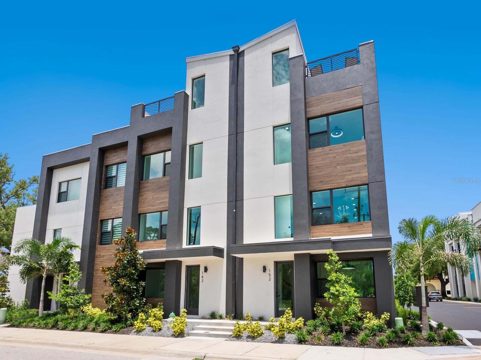 Are you dreaming of the ideal uptown location close to everything Sarasota? Discover modern Sarasota living with outdoor style at Premier on Main in the Park District at the east end of Main Street, downtown Sarasota. Ready to live your best Sarasota life? Welcome to Premier on Main, a just-completed collection of contemporary townhomes designed for those who crave outdoor living, accessible culture and modern style in the heart of Uptown as we call it. 

Near Main Street’s bustling arts and cultural district, farmers market, buzzworthy restaurants, live music venues and the new 53-acre bayfront park, this is your gateway to the ultimate Florida lifestyle. Morning runs over John Ringling Bridge. Sunset drinks on the rooftop. Bike to brunch or kayak the bay. This is the Sarasota experience elevated. Designed for your active, social life. 

Over 2,395 total square feet including 1,950 air-conditioned living space. Incredible 396-square-foot rooftop entertainment deck with optional hot tub and outdoor kitchen, ideal for sunny lounging or hosting friends under the stars. Spacious, light-filled living areas with soaring ceilings and designer finishes. Chef-inspired kitchen with oversized island and premium stainless appliances. Private elevator for easy living across all levels. Two bedrooms with en-suite baths and walk-in closets—room for guests, roommates or that home office you’ve always wanted. Urban convenient, Sarasota cool. Just blocks from the bayfront and downtown nightlife. Close to local cafes, restaurants, arts venues and farmers market. Bike-friendly location with easy access to parks and beaches. Sleek, contemporary architecture with high-end details. 

Energy-efficient systems and impact-rated windows and doors for safety and peace of mind. Practical perks for modern buyers. Private two-car garage with bonus flex space, ideal for gym, studio or gear storage. Low maintenance living with HOA covering landscaping, road upkeep and more. Move-in ready with special developer financing incentives available for a limited time. See why Sarasota millennials and modern buyers are choosing Premier on Main for their next-level urban lifestyle. Visit this fully furnished model or our 3 bedroom model next door at 2170 Fruitville Road. Open weekends noon-3 p.m. or by appointment. Contracts are being accepted now so grab your slice of downtown Sarasota before it’s gone!