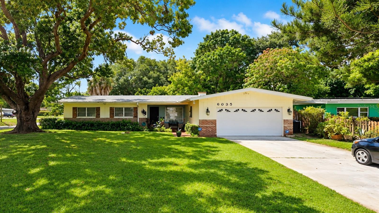 Hard-to-find move-in-ready large 3 bed / 2 bath home on a beautiful ample corner lot in one of the most well located and rapidly appreciating pockets of South St. Petersburg. The owner’s surprise relocation gives you the unique opportunity to secure this spacious 1,752 sqft concrete-block home, the largest home in the block, with major big-ticket updates already completed, at the lowest price per sq ft in the area by far. While some light cosmetic TLC may be desired, absolutely no major issues. So what makes this one so special? 1) Brand new roof in 2020, with the Brand new flat roof just installed in June 2026. 2) New central A/C system installed in 2024. 3) Major electrical upgrade completed in 2023, including updated wiring and electrical panel. 4) New exterior paint completed in 2025, giving the home a clean and refreshed look. 5) Large attached 2-car garage providing ample space for vehicles, storage, tools, and toys. 6) Beautiful large elevated .215 acre corner lot on a quiet residential street. High and dry, never flooded. Rear patio and yard offer plenty of outdoor space for pets, entertaining, grilling, and enjoying the Florida sunshine. 7) Well-equipped kitchen featuring ample counter space and solid wood cabinets. 8) Home on city sewer and water, sprinkler system on well with timers, helping maintain the grounds while reducing irrigation costs. 9) Solid concrete-block construction, thoughtfully designed and originally built by a hardware store owner, offering durability and peace of mind. 10) Unbeatable location just minutes from Downtown St. Petersburg, St. Pete Beach and other award-winning Gulf beaches, premier shopping, dining, entertainment, marinas, waterfront parks, and nearby boat ramps including Maximo Park and Bay Vista Waterfront Park. With major systems already updated, a large elevated corner lot, solid block construction, and a fantastic location, this home offers an exceptional combination of value, space, and long-term upside. Whether you’re looking for your next primary residence, a well-located rental, or a move-in-ready home where you can add your own finishing touches, this one checks all the boxes. Easy to show. No HOA/CDD. Feel free to soft pitch before writing anything up. MLS info sheet and disclosures available. No assignable contracts accepted.