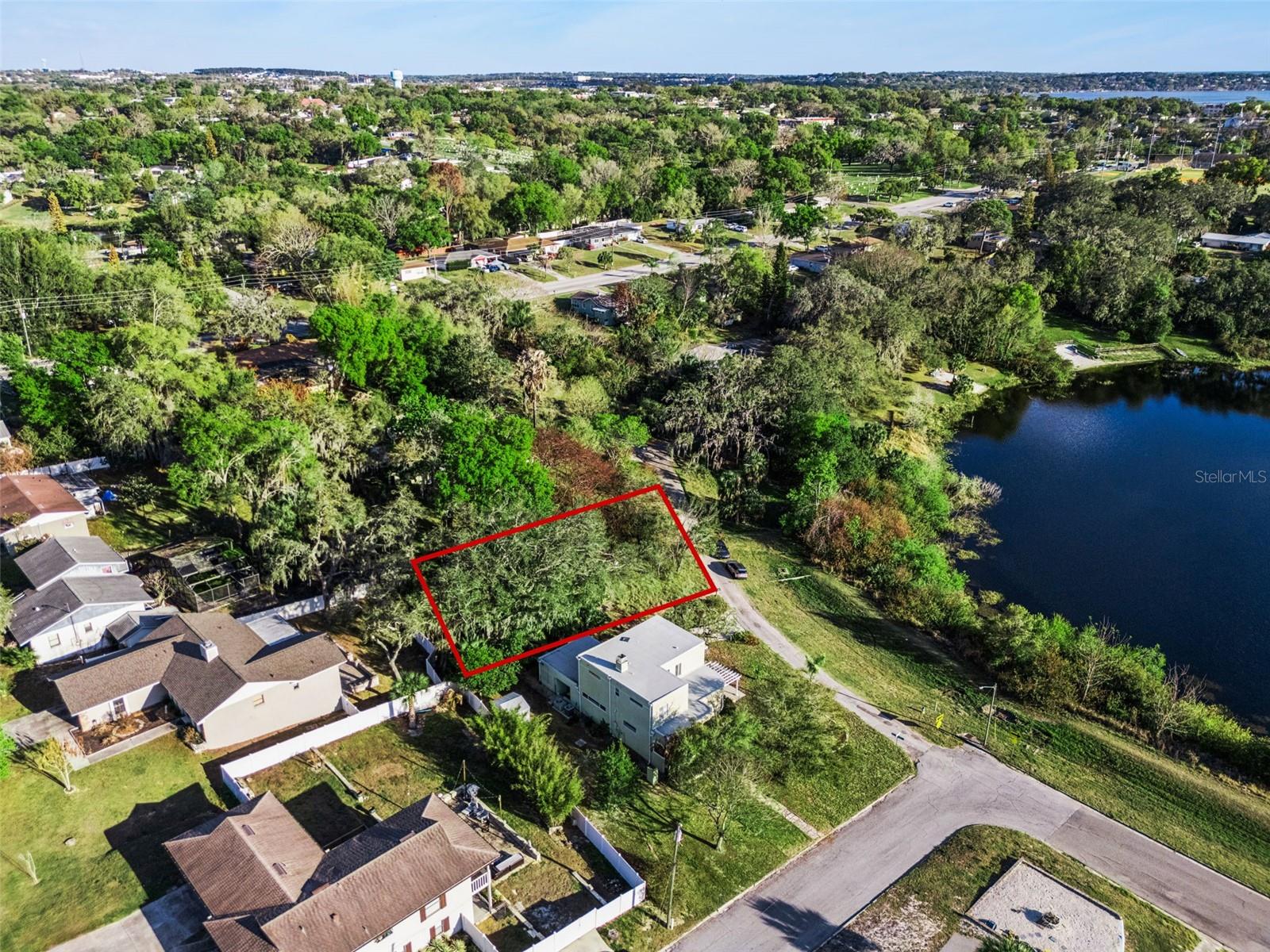 Imagine ending every day with shimmering lake views, gentle breezes through the windows of your custom designed lakeview home. 
Nearly every room will invite you to pause, relax, and take in the view from this rarely available lot overlooking Crystal Lake in Historic Downtown Clermont.
Beyond the property itself, the lifestyle offered by this location is simply exceptional. Just minutes away by golf cart, bicycle, or on foot, historic downtown Clermont has transformed into one of Central Florida's most vibrant waterfront destinations. Enjoy evenings filled with live music, craft breweries, wine bars, waterfront dining, boutique shopping, farmers markets, festivals, and community events. Local favorites include Suncreek Brewery, Roasted Spirit, The Bell Clermont, Pepe's Cantina Clermont, and the lakefront atmosphere of Salt Shack, all contributing to the energetic yet relaxed charm that has made downtown Clermont one of Central Florida's most sought-after destinations.
Outdoor enthusiasts will appreciate access to Lake Minneola Waterfront Park, Victory Pointe, the South Lake Trail system, beaches, boating, paddleboarding, cycling, and miles of scenic walking paths. Clermont continues to invest heavily in its downtown and waterfront districts through long-term master plan improvements designed to further connect the downtown core with the lakeshore, expand recreation opportunities, enhance gathering spaces, and support additional dining, entertainment, and hospitality venues.

Adding to the excitement, city leaders are actively pursuing plans for a multi-level downtown parking structure near the waterfront and entertainment district to support continued growth and make access to downtown restaurants, shops, events, and waterfront attractions even more convenient for residents and visitors.

Lots with this level of lake views, and future potential rarely become available. Come experience the views, the design, and the lifestyle that make this property truly unforgettable. If you are looking for a lot in one of the  most sought-after destinations....look no further.

 Whether you envision preserving additional privacy, creating a future family compound, building a second residence for loved ones, designing a guest home, or securing a valuable investment for years to come, the possibilities are exceptional. In a location where available land is becoming increasingly scarce, this neighboring parcel offers flexibility and future potential that few properties can match. Purchase it now for your family's next chapter, hold it as a long-term investment, or create custom living space while maintaining the unique character and privacy of this remarkable lakeview setting.
Now available separately or together with the home at 190 Crystal Lake Dr. (MLS#G5109694). HIGHEST AND BEST OFFERS REQUESTED from all interested parties by 6/28/2026. Due to high volume of interest and offers Sellers are requesting 14 day period for offers from perspective Buyers before review.