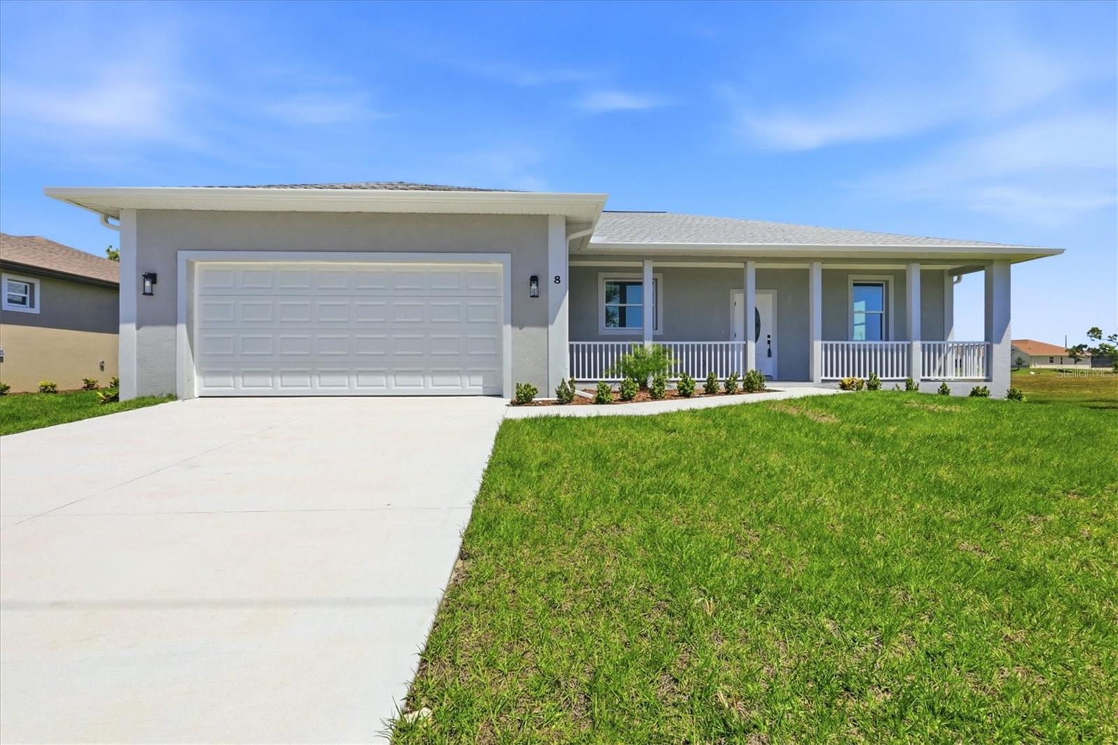 Welcome home to Rotonda Sands (AKA Sands of Placida) and this new construction 3 bed, 2 bath home situated on a cul de sac Court now with reduced price.  From the front porch that shouts WELCOME HOME, to the open floor plan and ever sought out split bedroom floor plan you will be delighted with all you see.  Generously sized great room open to the kitchen with island, shaker style cabinets and beautiful granite counters all complemented by stainless appliances.  Adjacent dining area has sliders that give easy access to the back patio for outside dining if you so choose make this area the perfect layout for entertaining or just hosting a good size group.  Primary bedroom boasts an appx. 9'x7' walk in closet as well as en suite bathroom with granite counters, dual sinks and step in shower with floor to ceiling tile.  You'll find the same since of style in the 2nd bath with tub/shower combo, spacious granite top and doorway that exits to back yard - perfect if planning for possible  future pool.  Tankless hot water heater, Impact windows and doors, Irrigation as well as beautiful landscaping round out the package in this beautiful home.  You'll also appreciate that gulf beaches are about a 15minute drive as are multiple golf courses, Pioneer walking/biking trail runs through development and boating and so much more that shouts come live the Florida lifestyle!  Don't delay, call for private showing.