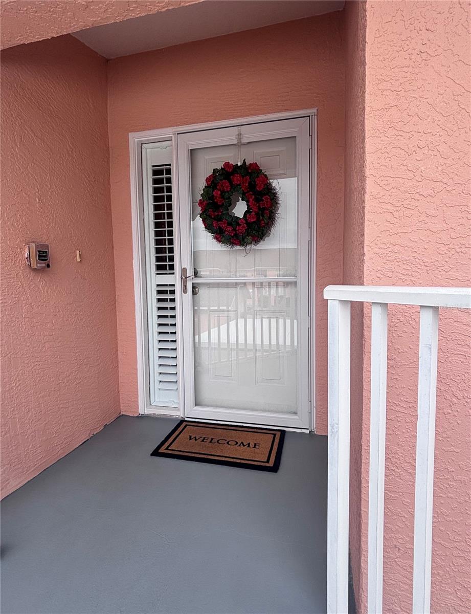 Welcome to this well-maintained 2-bedroom, 2-bath second-floor condominium offering over 1,000 square feet of comfortable living space with an open-concept design ideal for both seasonal residents and year-round enjoyment. Water's Edge at Heritage Oak Park is one of Port Charlotte's most desirable gated communities, where resort-style amenities and beautiful oak-canopied streets create the perfect Florida lifestyle. 
Upon arrival, you'll appreciate the Andersen glass storm door with a disappearing screen and the newly installed motion-sensor front entry light (2024). Step inside to discover a bright, inviting interior featuring FRESH PAINT completed in 2022-2023, luxury BAMBOO flooring throughout the main living areas, and tile flooring in the kitchen, bathrooms, and laundry room. PLANTATION SHUTTERS adorn the front windows, adding both timeless style and privacy.
The thoughtfully designed floor plan offers a spacious living and dining area that flows seamlessly into the kitchen, complete with a breakfast bar, dinette area. The kitchen has also been UPDATED with WHIRLPOOL APPLIANCES, including a refrigerator, electric range, microwave, and dishwasher, all installed in 2024. The desirable split-bedroom layout provides privacy and comfort for both owners and guests.
For added peace of mind, a HOME WARRANTY for a year, PGT IMPACT-RESISTANT STORM WINDOWS were installed in November 2021, enhancing storm protection, energy efficiency, and security. Sliding glass doors lead to the screened lanai, where privacy sunblock screens create a comfortable outdoor retreat—perfect for enjoying your morning coffee, relaxing with a book, or taking in the peaceful surroundings.
The spacious primary suite features a walk-in closet and private bath, while the guest bedroom and adjacent bath provide comfortable accommodations for family and friends. Additional conveniences include an in-unit laundry room with a 2023 Whirlpool washer and dryer, covered resident parking, guest parking, private storage, and the ease of low-maintenance condominium living.
Residents of Heritage Oak Park enjoy an impressive array of amenities, including a heated pool and spa, clubhouse, fitness center, tennis and pickleball courts, bocce ball, shuffleboard, walking paths, Fishing Pond and a vibrant social calendar. The community is also golf-cart friendly. Ideally located near Charlotte Harbor, downtown Punta Gorda, Fishermen's Village, waterfront parks, golf courses, boating, fishing, dining, shopping, and Gulf beaches, residents enjoy endless opportunities to experience the best of Southwest Florida's active and coastal lifestyle.
