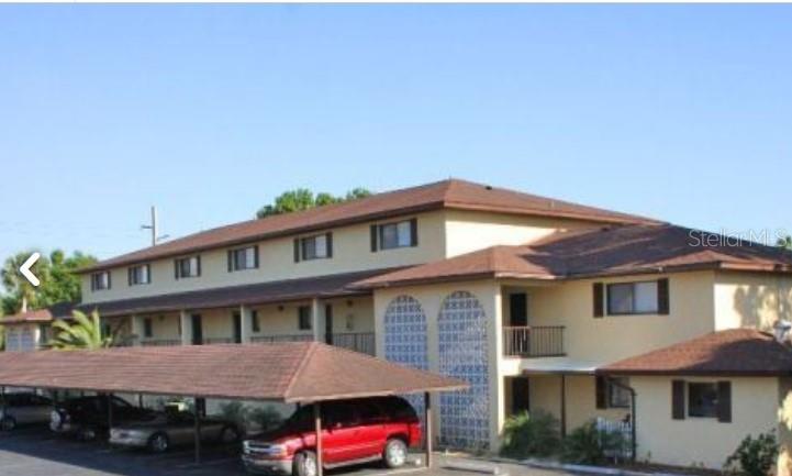 Free standing Building,  NO HOA.  13 total units, (7)- 2 Bedroom & 2 Bathroom and (6) -2 Bedroom x 2.5 Bathroom Townhomes, New Luxury Vinyl Flooring, New Kitchen -Cabinets and Quartz countertops & Appliances, New Bathrooms - Quartz countertops and fixtures, New Paint, updated molding and accent wall. Ground floor units have newly tiled patio and new screen lanai. A/C units and water heaters are mostly new or less than 4 years old. Roof replacement underway (to be completed prior to closing)  View of Golf Course and large back yard. 14 Covered parking spaces, 10 additional + 6 shared guest parking spaces.  Most units updated. Current rent rolls and P&L available upon request