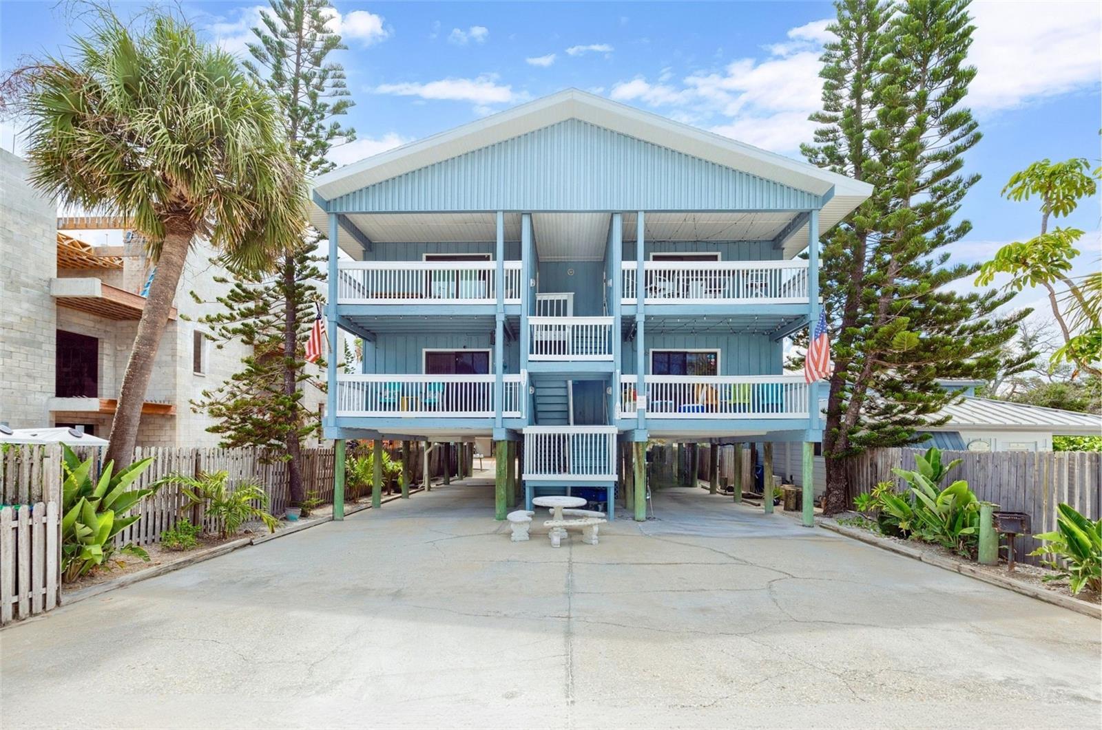 Welcome to your own piece of Indian Rocks Beach. Perfectly positioned on the Gulf side of Gulf Boulevard, this beautifully furnished three-bedroom, two-bath corner condominium offers the ideal blend of comfort, convenience, and coastal living just steps from the sugar-white sands of the Gulf of Mexico.

Located within the intimate Ship-A-Hoey Condominium, a boutique community with only four residences, this home offers privacy while placing you in the heart of one of Pinellas County's most loved beach towns. Whether you're looking for a full-time residence, a vacation getaway, or an income-producing investment, this property offers outstanding flexibility with a minimum three-day rental policy, making it an excellent opportunity for both personal enjoyment and rental income.

Inside, the open floor plan is bright and inviting, featuring luxury vinyl plank flooring, solid wood cabinetry, stone countertops, stainless steel appliances, and tasteful coastal finishes throughout. The living and dining areas open to a private west-facing balcony where you can enjoy partial Gulf views and beautiful sunsets after a day at the beach.

The primary suite offers a walk-in closet and private bath, while two additional bedrooms provide comfortable accommodations for family and guests. A full-size washer and dryer, private interior laundry closet, dedicated storage closet, and two assigned under-building parking spaces add everyday convenience.

Recent exterior improvements, including a new roof and freshly painted exterior, provide added peace of mind. The monthly condominium fee includes water, sewer, trash, exterior maintenance, pest control, and property insurance, creating a low-maintenance ownership experience.

With the flexibility to rent every three days, this property presents an excellent opportunity to generate rental income while enjoying everything Indian Rocks Beach has to offer. Waterfront dining, local shops, parks, boating, fishing, and miles of beautiful beaches are all just moments away, making this a place you'll enjoy year-round.
