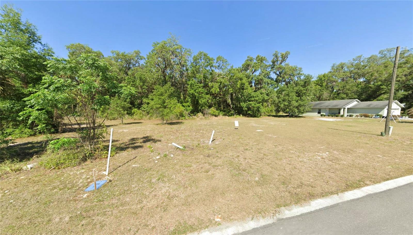 Build your dream home or invest in the future with this prime .26-acre vacant lot located on a paved road just minutes from town, shopping, dining, schools, and everyday conveniences. Offering a great balance of privacy and accessibility, this property provides the perfect setting for a custom home or a spec build opportunity for investors looking to capitalize on a growing area. With easy access and a desirable location close to all amenities, the possibilities are endless. Whether you’re ready to create your ideal home or add to your investment portfolio, this lot is full of potential. Don’t miss your chance to secure a great piece of land in a convenient and developing location!