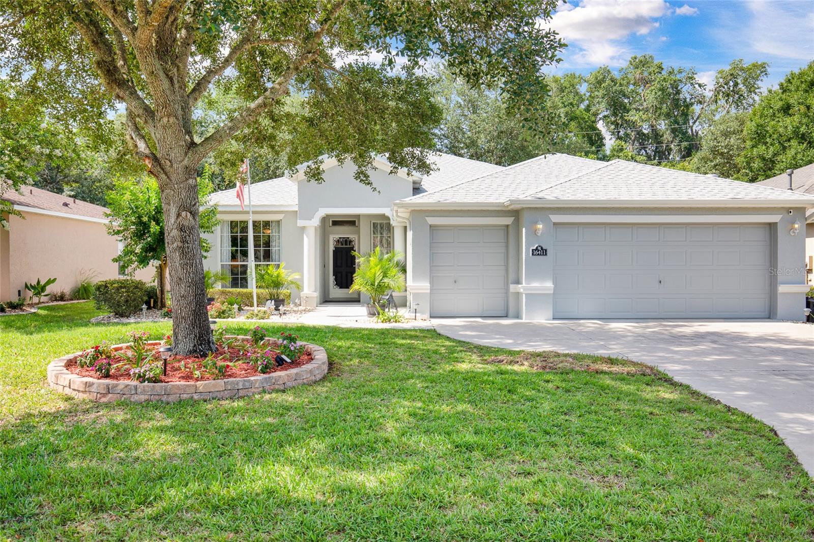 Welcome to this solidly built and meticulously maintained custom Sanibel III, located in the gated golf community of SummerGlen. This spacious 3-bedroom, 2-bath home offers a desirable split floor plan with formal living, great room, den, two dining areas, and a well-appointed cook’s kitchen featuring 42-inch real wood customized cabinetry, Corian countertops, gas cooking, and a sizeable pantry.
Natural light fills the main living areas through a centrally located solar tube, and the home features tile and wood flooring throughout with no carpet. The oversized laundry room provides excellent function with extra shelving, an additional refrigerator, and a folding table. The generous primary suite includes ample closet space, dual sinks, a styling station, private water closet, jetted tub, and tiled Roman shower with grab bar and corner seat.
Relax on the screened lanai overlooking a private rear setting with no rear neighbors. Additional highlights include a Trane AC installed in June 2021, New Roof 2026, newer kitchen refrigerator, tankless Rinnai hot water system, water softener, oversized garage deep enough for a truck, golf cart garage, utility sink, and both 30-amp and 50-amp RV receptacles. Enjoy the gated resort-style lifestyle of SummerGlen in a beautifully maintained home with space, storage, and comfort throughout.