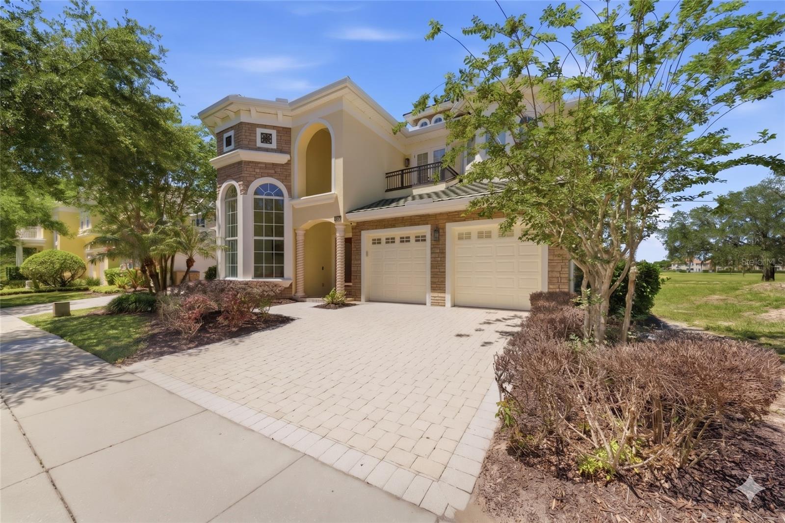*ACTIVE MEMBERSHIP AVAILABLE*** MUST SEE HOME!!! Located at the end of a quiet cul-de-sac backing up to the tee box of the 7th hole of the Watson designed course in the one of a kind Reunion Resort & Golf Club. Architecturally designed to impress, and accentuated with HIGH-END finishes throughout such as, upgraded light fixtures, soaring ceilings, Cambria Quartz countertops throughout and  large windows throughout enhancing the natural light. The Great room opens up into the expansive Lanai area, boasting a large pool & Sauna all WEST FACING WITH SPECTACULAR SUNSET & GOLF COURSE VIEWS! This home has been used only as a personal rental home and has never been rented. It has been meticulously maintained by the current and original owners, it has been equipped with all the upgrades to make it a top rental performer. The current owner has converted the garage to be the ultimate themed game room with all the fan favorites such as the multiple game arcade machine, the Golden Tee, side by side immersive racing machines , Skee Ball, and Basketball Shoot game. Able to occupy 15 guests, and suited for both families or adult groups. It features a Mickey themed bunk room as well as a Encanto themed room. The downstairs billiard room is equipped with a professional style pool table and leads into the oversized dining room table and separate gathering area, perfect for entertaining. The two large upstairs en- suites, with king sized beds, both have private access to the oversized balcony and sensational views, with one featuring a small office area for those who must bring their work with them. The first floor oversized Master Bedroom features a stand alone tub and sliding doors that open up to the lanai. All rooms beside the Encanto themed room are en-suites. This home went through an extensive renovation by previous owners in 2022 with the following upgrades: All new flooring throughout the entire home, repainted ceilings, walls, & trim throughout the home, complete remodel of both master bathrooms with BRAND NEW custom showers in three bathrooms. Stand-alone tubs and designer champagne bronze tub fillers added in both master baths, nearly every window in the home has been replaced, and updated every light fixture in the home. BRAND NEW LED can lights both inside and outside of the homer. Custom linen draperies, shutters and blinds from Cameron Designs in Orlando, All new Cambria Quartz countertops throughout -- kitchen, baths, laundry room, upstairs bar area and dining room buffet. Removed the upstairs laundry room, moved walls, and added an additional bedroom. Additional HVAC venting and electrical added for the new room. Flat screen TV's, double front-load washer and dryer to laundry room. Added a second vent and electrical for additional units, and more! No expense was spared during the renovations of this truly TURN KEY property! Located in a luxury Reunion Resort, one of the kind in the World, the 3 World Class Championship GOLF COURSES and so much more to enjoy! Make this home your primary residence, second home, or income producing rental home! Start making lifelong family memories today!! Dream home, dream views, dream location for family who loves elegance! Schedule your showing today!