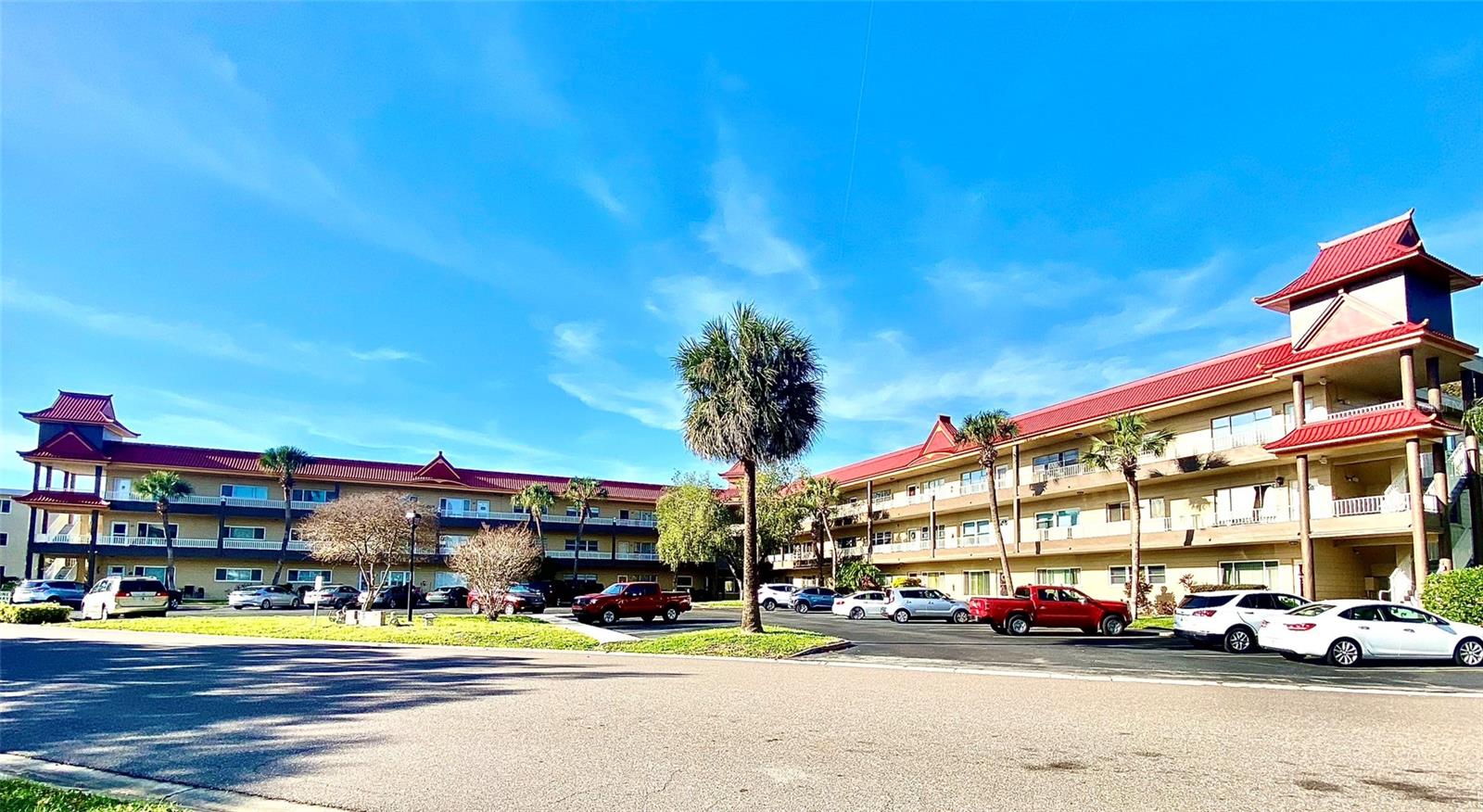 Welcome home to this first floor, F-Deluxe Model! Pull right up, walk right in, suitcases in hand. This condo conveys fully furnished down to linens & dishes! Offering newer windows, flooring throughout, washer/dryer inside, stainless appliances and covered back patio! A very spacious unit that has newer kitchen and bathroom updates and plenty of storage. Here, you will have FL living at it’s best, all in resort style living!
Assigned parking. The 55+ community has two activity centers, and two private golf courses with 9 and 18 holes, free exclusively for resident owners. There are two swimming pools; one is heated. The remodeled Cardio Gym has the latest exercise equipment. A very pet-friendly community, there is a fenced dog park with covered seating. There are hobby studios, and a wood shop for the exclusive use of the residents. Activities include fitness classes, dancing, clubs, cards, billiards, entertainment, classes, and much more. The on-site Good Karma Café has take & bake meals and snacks. Close to beaches, transportation, shopping, entertainment, and fine dining. All room sizes, floor plans and square footage are approximate. This property is being transferred by a leasehold estate deed. Association approval is required. If financing, 35% down is required.