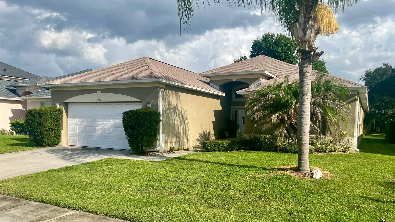 Imagine starting your morning with a cup of coffee on your screened-in lanai, surrounded by peaceful backyard views and the privacy of no rear neighbors. It's the perfect place to relax, entertain, or simply enjoy everything that makes Florida living so special. Inside, this beautifully maintained 3-bedroom, 3-bath home welcomes you with soaring ceilings, abundant natural light, and an open floor plan that feels both spacious and inviting. The kitchen offers generous cabinet space and a seamless connection to the living and dining areas, creating a warm and welcoming space for everyday living, family gatherings, and entertaining. The spacious primary suite is your own private retreat, complete with two walk-in closets, dual vanities, a garden tub, and a separate walk-in shower. A versatile bonus room gives you the flexibility to create a home office, guest room, playroom, or hobby space to fit your lifestyle. Located in the sought-after Oaks community, you'll enjoy tennis and basketball courts, playgrounds, walking trails, and access to Lake Tohopekaliga via the community boat ramp on Shingle Creek. Just minutes from shopping, dining, major highways, Orlando International Airport, and Central Florida's world-famous attractions, this home offers the perfect balance of comfort, convenience, and everyday living. This isn't just a place to live. It's a place to feel at home. Come see it for yourself.