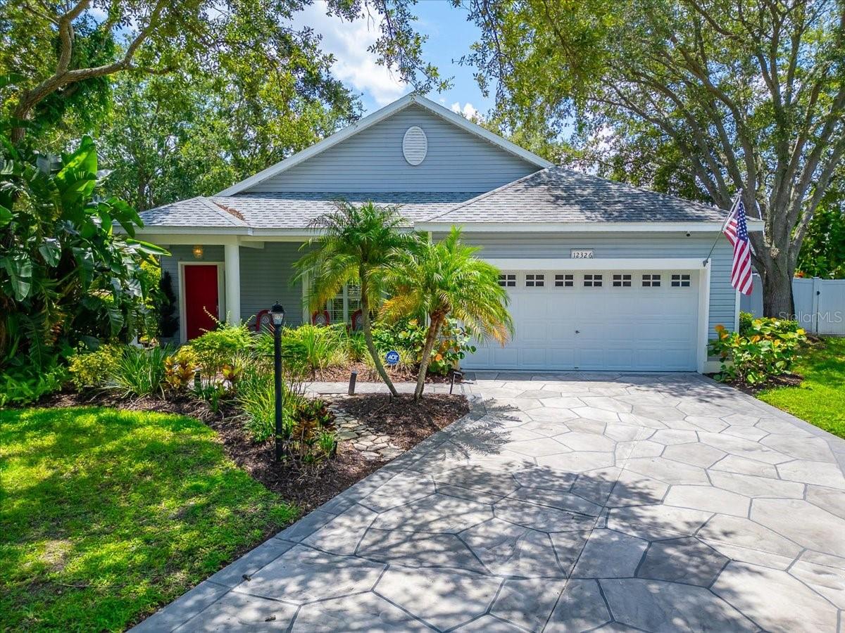 RARE FIND! Over $120,000 in RECENT UPGRADES, this Bruce Williams-built 3-bedroom, 2-bath HEATED POOL HOME offers quality construction, modern finishes, and a PRIME LOCATION on a quiet cul-de-sac in the established Summerfield Village of Lakewood Ranch. Situated on an oversized, FULLY FENCED homesite with peaceful POND VIEW, this home has been COMPLETELY RENOVATED, allowing buyers to move in without the expense or hassle of major projects.
The OPEN FLOOR PLAN fills the home with natural light and features CERAMIC TILE FLOORING, NO CARPET, CROWN MOLDING, and INTERIOR SHUTTERS throughout the home. The open kitchen showcases STAINLESS STEEL APPLIANCES, GAS STOVE, solid wood countertops and large island with bar seating. Both bathrooms have been completely renovated with updated fixtures, finishes and marbled tile.
The screened in HEATED POOL and screened in lanai overlook the pond, creating a private outdoor space for relaxing or entertaining. Additional exterior features include an awning, decorative driveway, front entry walkway, Southern-style front porch, and beautifully maintained landscaping that adds to the home's curb appeal.
UPGRADES: NEW heated pool (2023), NEW pool cage (2024), NEW flooring (2022), FULLY renovated bathrooms (2022), New fireplace stone wall (2022) epoxy garage floor (2022), A/C (2019), ROOF (2017), and a Rinnai TANKLESS water heater.
Just a short bike ride away, Summerfield Park offers three playgrounds, a rock-climbing wall, tennis and pickleball courts, basketball courts, baseball and soccer fields, jogging trails, and open green space. Residents also enjoy nearby Heron's Nest Nature Park, Greenbrook Adventure Park, and miles of walking and biking trails throughout Lakewood Ranch. Located within the highly rated McNeal Elementary, Nolan Middle, and Lakewood Ranch High School districts, the home is also minutes from Main Street Lakewood Ranch, Waterside Place, UTC Mall, shopping, dining, medical facilities, and I-75. The HOA is only $102 annually, and because the home is located in an X flood zone, flood insurance is not required by most mortgage lenders.