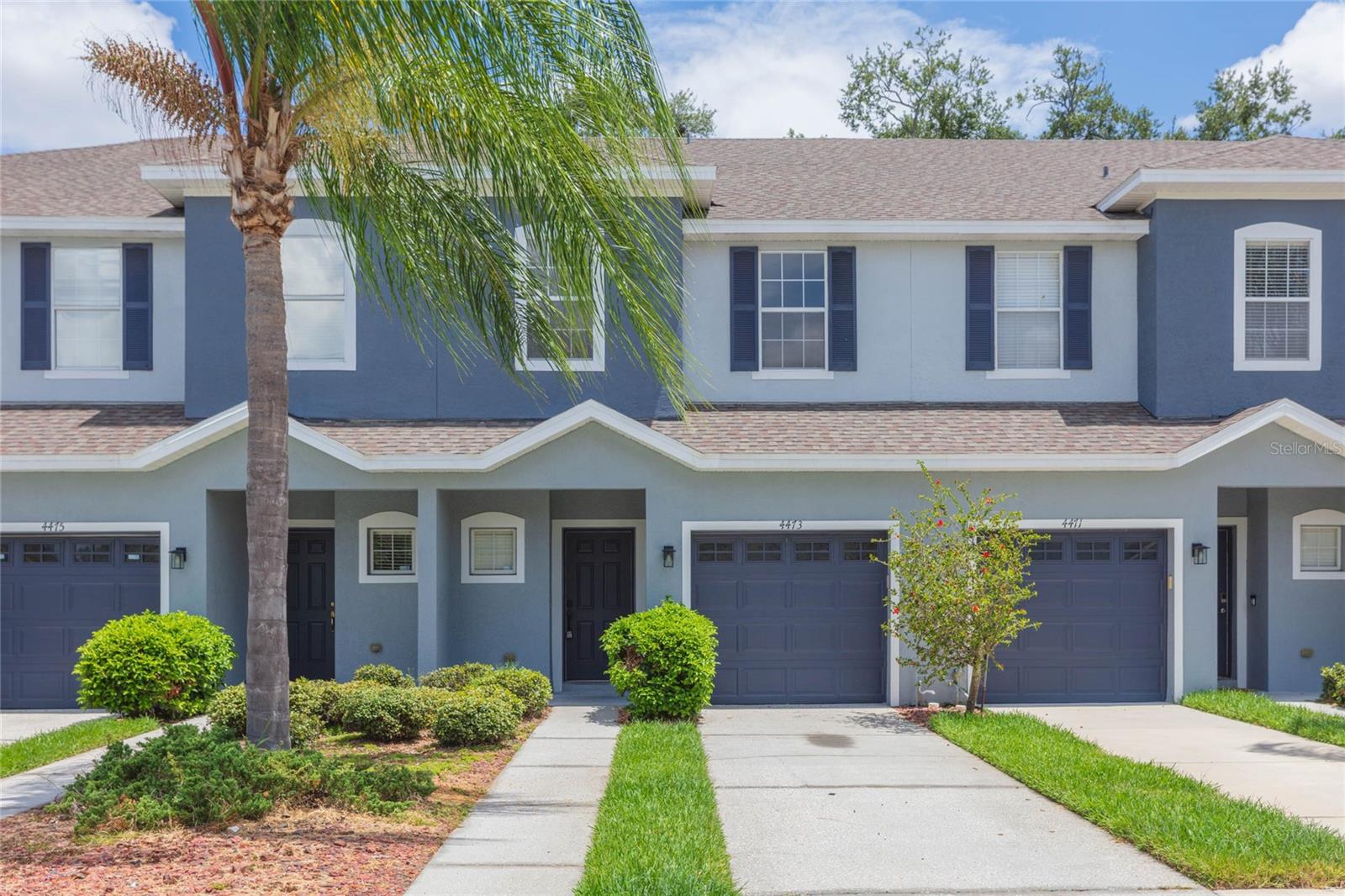 Located in the quiet, GATED community of Amberly Oaks, this well-maintained 3 bedroom, 2.5 bath townhome offers a functional open floorplan and a 1-car garage. Updates include: fresh interior paint (2026), AC (2023), roof (2021), epoxy garage flooring and LVP flooring. The main level features a convenient half bath, perfect for guest use and seamless flow between living, dining, and kitchen spaces. The kitchen boasts 42" cabinetry with crown molding and large breakfast bar overlooking the dining area. Glass sliders lead out onto the screened lanai where you will enjoy the peaceful surround and mature landscaping. Upstairs, the primary bedroom includes a private ensuite bath with dual sinks, glass shower, separate soaking tub and an oversized walk-in closet. The secondary bedrooms share the remaining full bath. Amberly Oaks offers low-maintenance living with exterior maintenance, lawn care, pest control and water included in the HOA. No CDD! Location could not be better being near Carrollwood, Downtown Tampa, Tampa International Airport, shopping, dining, hospitals, and major highways for easy commuting.