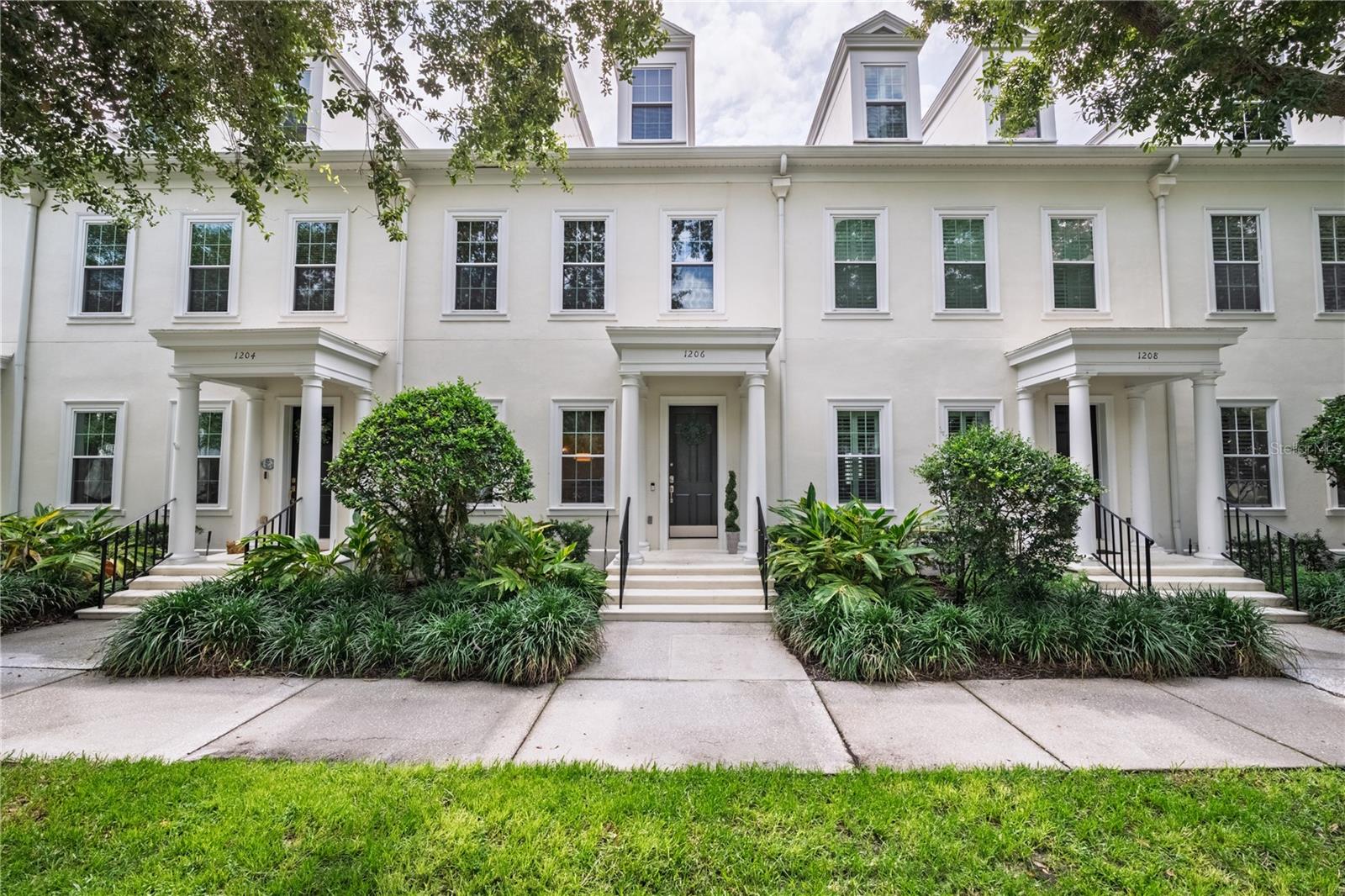 Welcome to the heart of Celebration, Florida! This stunning, fully remodeled 3-story townhome offers the ultimate blend of modern luxury and convenience, located just steps from vibrant community pools, parks, trails & Downtown. The main level boasts a spacious, open floor plan with a chef’s kitchen featuring a breakfast nook, additional seating, and seamless flow into a bright living area. Upstairs, the second floor hosts two secondary bedrooms and a luxurious master suite, complete with a modern en-suite bath, & custom walk-in closet. The massive, 800 sq. ft. third-floor offers a multi-generational suite has endless flexibility and features its own living room, wet bar, and private bedroom and bathroom as well as a custom closet. Outside, enjoy a charming private patio and a 2-car garage with WiFi-enabled doors and a fully decked attic for ample storage. In addition to the modern remodel on the townhome you will also find, upgraded windows have been installed, newer AC units installed, and a energy-efficient hybrid water heater.  This turnkey home is a dream come true!