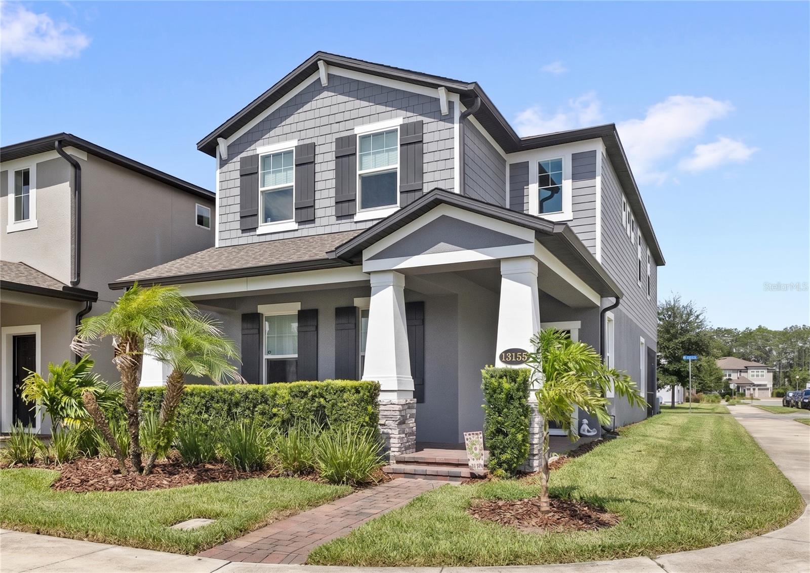 Welcome to this beautifully appointed 4-bedroom, 3.5-bath home offering over 2,800 square feet of thoughtfully designed living space in the highly desirable Encore at Ovation community of Horizon West. Perfectly positioned on a premium corner lot, this home combines modern style, functional living, and an unbeatable location just 20 minutes from Walt Disney World.
Step inside to discover gorgeous flooring throughout, a light and airy open-concept layout, and a timeless palette of neutral colors that complements any décor. The spacious kitchen flows seamlessly into the dining and living areas, creating an ideal space for entertaining and everyday living.
A highly sought-after first-floor guest suite provides privacy and flexibility for visitors or multi-generational living. Upstairs, you'll find a generous loft with an open bannister, offering the perfect space for a media room, playroom, or home office. The conveniently located second-floor laundry room makes daily living effortless.
The spacious primary suite serves as a relaxing retreat, while the additional bedrooms provide ample room for family and guests. Step outside to enjoy Florida living year-round on the screened-in lanai, ideal for morning coffee, outdoor dining, or unwinding in the evenings.
Located in the sought-after Encore at Ovation community, this exceptional home offers easy access to major highways, top-rated schools, and Central Florida's world-famous attractions. With its desirable floor plan, stylish finishes, and prime Horizon West location, this home is one you won't want to miss.