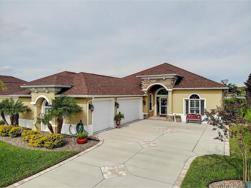 This beautifully maintained 4 year old Paytas home is located on one of the nicest corners in Promenade Park/Venetian Bay.  This Ideal pool home backs up to a large well kept and stocked lake with fountain.  Home has vaulted ceilings and entertainment center with gas fireplace. New porcelain wood-like flooring thru out except the master bedroom which has newer high grade carpet.  New landscaping with river rock bedding gives a beautiful curb appeal. Both bathrooms have walk in showers and large soaking tub in master Bath.  Friendliest neighbors around.  Close to I-95, Venetian Bay Town Center and Venetian Bay Golf Club.  This property is available for immediate move in!Motivated Seller.Furnishings negotiable. ;Water: City
