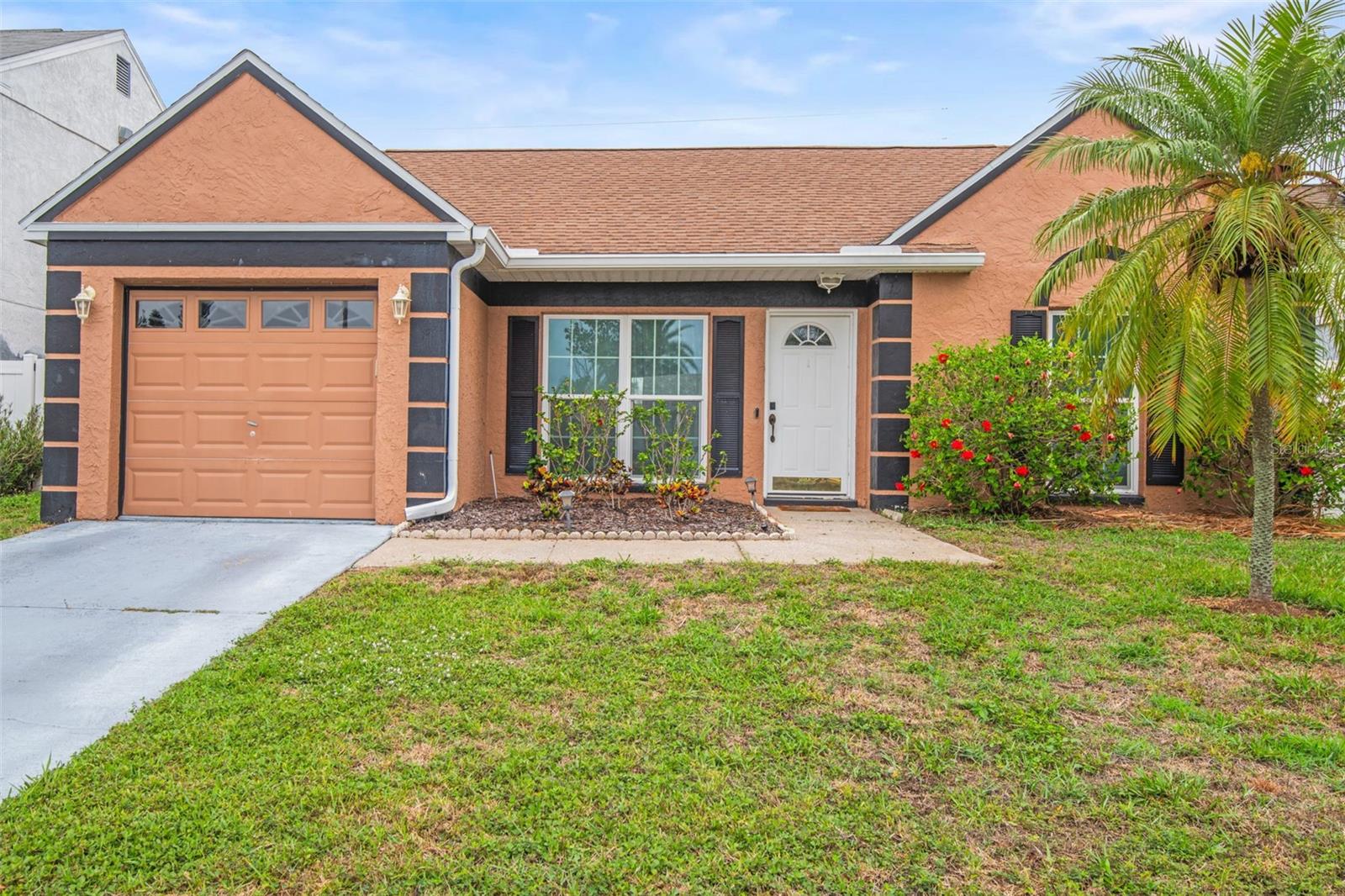 Welcome home to this stunning 3/2 single-family home with a single car garage located in the highly desirable Pinebrook Estates neighborhood. This beautifully remodeled home boasts a fully updated kitchen with a newer refrigerator, stainless steel appliances, ceramic flooring, white shaker-style cabinets, tiled backsplash and stone counters. Throughout the home you will find newer flooring, recessed lighting, washer and dryer, updated pendant lighting, ceiling fans throughout, and tons of natural light. You will love the privacy of the master suite with an updated en-suite bathroom and custom titled walk-in shower. When you step out back you will find a fully fenced yard and private patio area making it the perfect space to enjoy the Florida weather. Location! Location! Location! Conveniently located just minutes from some of Florida's top beaches, Pinebrook Park, Bardmoor Golf & Tennis Club, Clearwater International Airport, I275, shopping and award-winning restaurants. You'll have plenty of options for entertainment, leisure, and dining. NO HOA or FLOOD INSURANCE REQUIRED. Schedule you're viewing today, this beautiful home will not last.