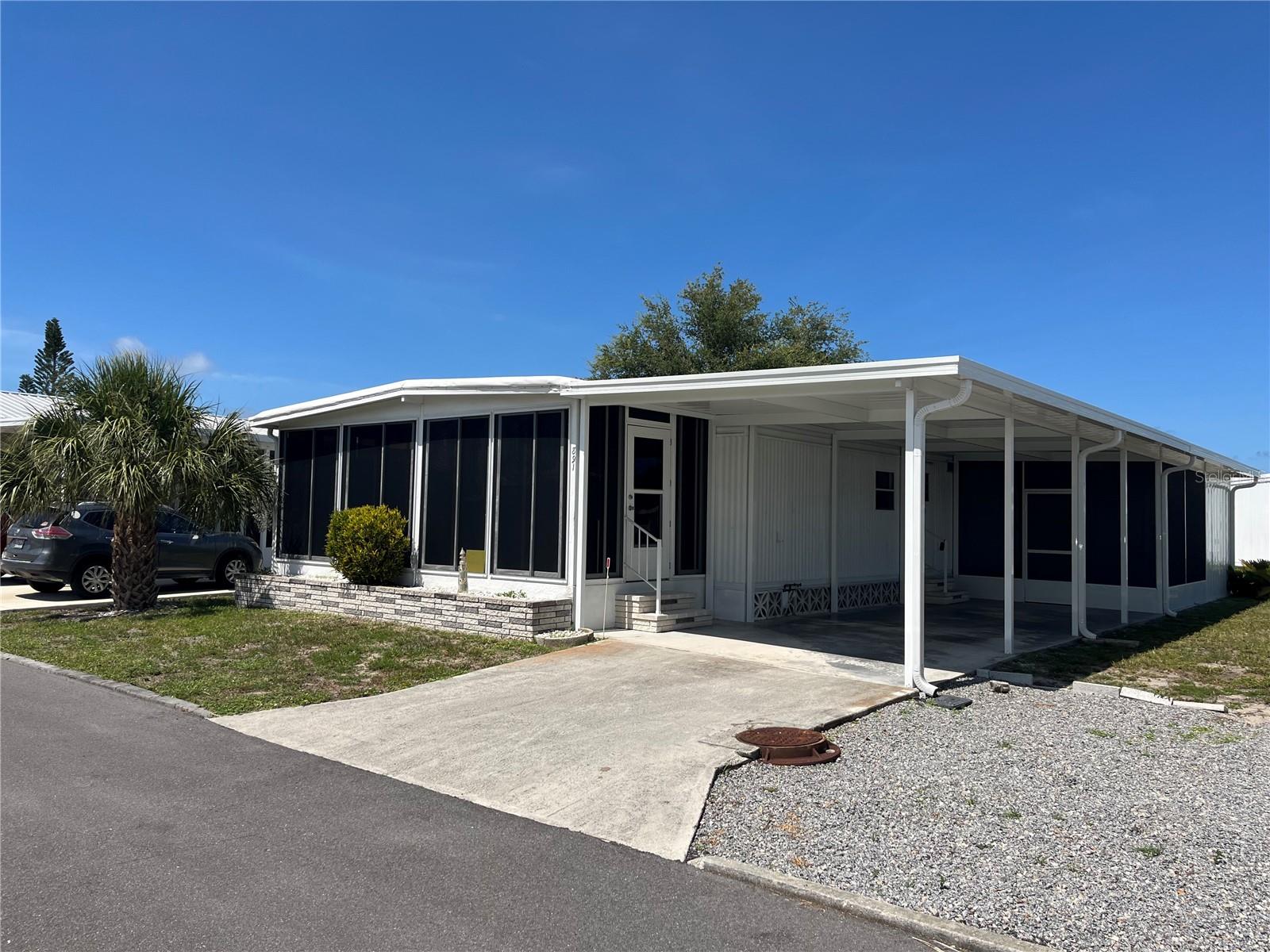 New carport, AC in 2022, new carport, shed and roof over,  Newer kitchen cabinets, Newer cpvc supply plumbing, A great screen room on the carport and a Florida room to boot, Newer hot water heater, new guest and master vanities, Laminate Flooring everywhere. Do not miss this bargain.
Venice Isle is the premier resident owned over 55 Mobile home Park in Venice.  There are close to 1000 homes with the most active residents. There is always something going on for you to do. We have many Park gatherings and first rate shows on site. The Park has every amenity you can imagine. Come take a walk through both of our 2 clubhouses and make yourself at home. The Park has 2 tennis courts, a fitness center, 2 heated pools, 2 hot tubs, saunas, putting greens, shuffleboard, Bocce ball, miniature golf, art rooms, pool room, TV lounges, card rooms, library, horseshoes, ceramic kilns, 2 huge ballrooms, Sunday services and much more!