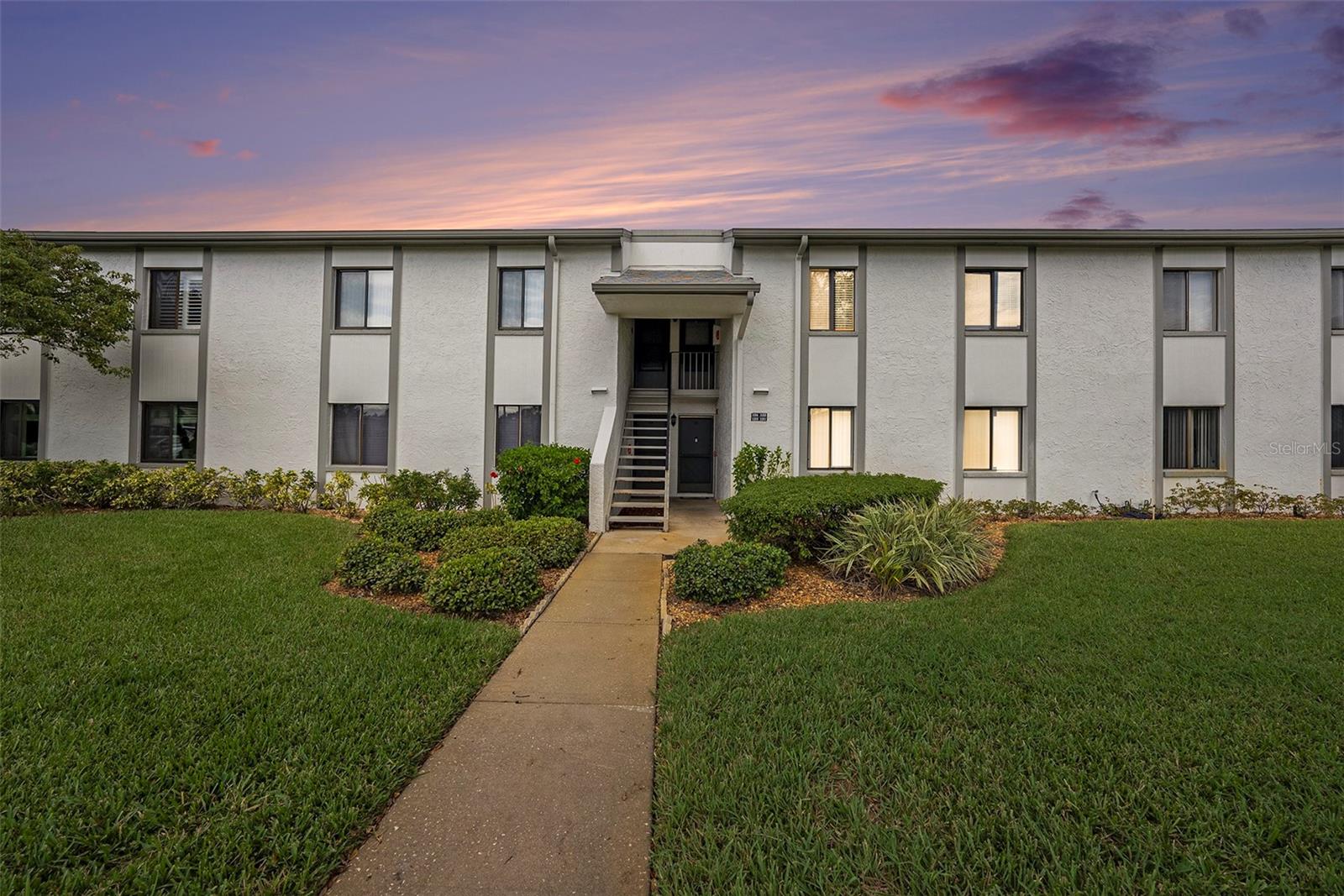 Welcome to this meticulously maintained 2-bedroom, 2-bath condo located in the desirable gated community of East Lake Woodlands! Situated on the second floor, this high-and-dry unit is free from flood zone concerns and boasts numerous recent upgrades. The primary bathroom was beautifully remodeled in May 2024, while the guest bath received a stylish tile refresh in 2022. Enjoy the comfort and efficiency of a brand-new HVAC system, installed in 2023. Offered optionally furnished, this condo is ready to be your winter retreat or year-round sanctuary. The condo is conveniently located just across from the pool so you can soak up the sun! East Lake Woodlands offers an array of amenities and a serene, secure lifestyle—schedule your showing today!