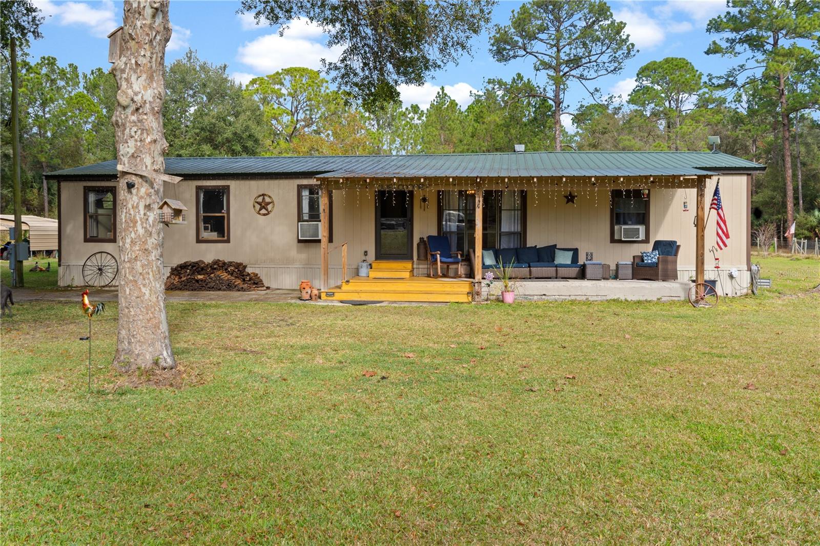 .Discover your own slice of paradise with this tranquil 6-acre fully fenced property in Citra! This beautifully remodeled double-wide mobile home is designed for comfort and style, providing a welcoming retreat. Ideal for entertaining, the outdoor space features an above-ground salt water pool and a charming tiki bar, perfect for summer gatherings and relaxing evenings.
Enjoy the added luxury of an outdoor shower, allowing you to rinse off after a day of adventure. The property is with-in minutes of ATV trails, making it a haven for outdoor enthusiasts and nature lovers. Explore the surrounding beauty and spot local wildlife right in your backyard.
Whether you seek a peaceful escape or a vibrant space for entertainment, this property offers the best of both worlds. Schedule your visit today and experience the serene lifestyle that awaits!