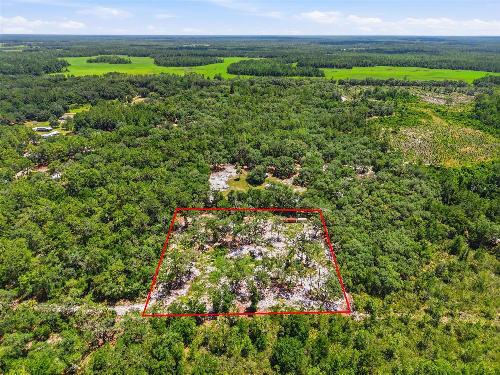 Ready to build! This 2.7-acre country parcel in Citra comes with a brand new well and 200-amp electric hookup already in place. Major site prep done and paid for. Power and phone/internet service nearby round out the utilities. Create your mini farm, homestead, or custom home site with the privacy of rural living and both Ocala and Gainesville just 30 minutes away. Survey available. Access is currently undeveloped, so come walk the land and picture the possibilities. Improved acreage with well and power at this price point doesn't sit long. Schedule your showing today!