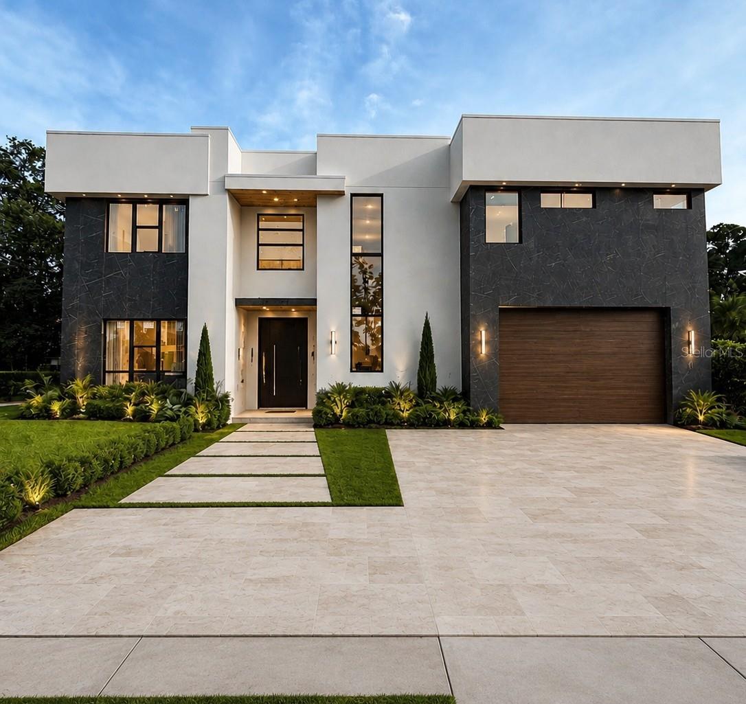 Under Construction. Completion date by 08/30/2026. Elegant 6,136 heated sq. ft. residence on a quiet cul-de-sac in one of South Tampa’s most sought-after neighborhoods. This modern home offers 6 bedrooms, 6 baths, an elevator, and a full master wing with an enormous walk-in closet. A dramatic huge pivot entry door features a touch-screen knob with AI face-detection for secure, seamless access. Entertain effortlessly with a beautiful pool and integrated jacuzzi, open living areas, and premium finishes throughout. Centrally located—about 10 minutes to the airport, 5 minutes to Bayshore, and 7 minutes to Hyde Park—with shops and supermarkets just minutes away. A rare combination of luxury, convenience and privacy. Schedule your showing today!