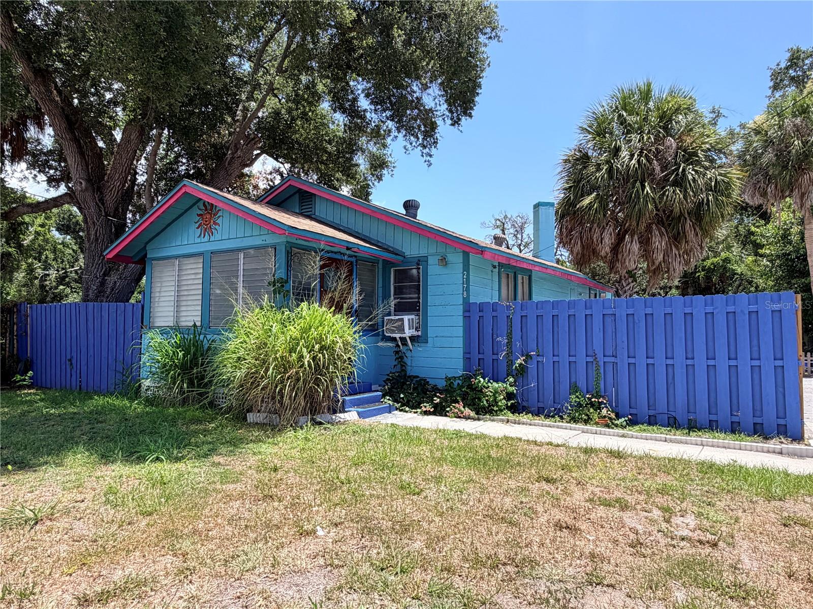 Virtually Staged. Bring your vision and creativity to this ideally located property just a short walk or bike ride from vibrant downtown Sarasota. Tucked away at the end of a quiet dead-end street, this home offers a rare sense of privacy with privately owned vacant lots behind, creating a peaceful and secluded setting while still being close to shopping, dining, entertainment, and the area's cultural attractions. Outside, you'll find a spacious approximately 20' x 40' paver area beside the home, providing ample parking space for vehicles, boats, trailers, or recreational equipment. The backyard features a charming gazebo, offering the perfect spot to unwind, entertain guests, or simply enjoy the tranquil surroundings. Whether you're looking for an investment opportunity, renovation project, or a place to create your own Sarasota retreat, this property offers exceptional potential in a highly desirable location.