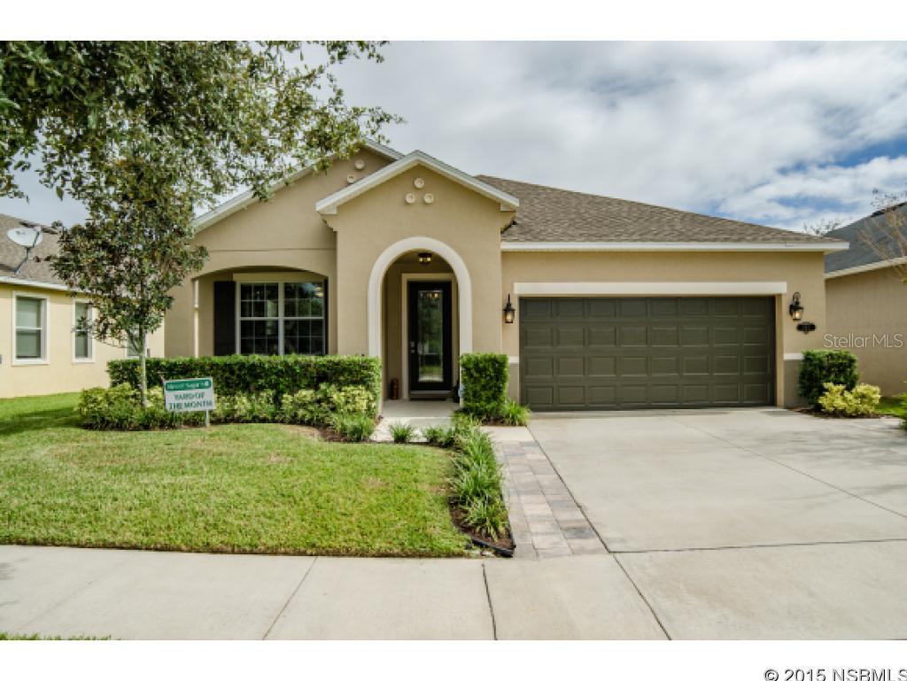 Fantastic home in the Isles of Sugar Mill subdivision.  This 3 bedroom, 2 bathroom home plus a Den offers a large open floor plan that has great views of the lake.  The kitchen is updated with beautiful wood cabinets and solid surface counters to fit your needs.  This home is just waiting for you to move in to.  The community has a swimming pool, a playground, and a walking trail that circles the neighborhood.  Look no further, this is the one. ;Water: City