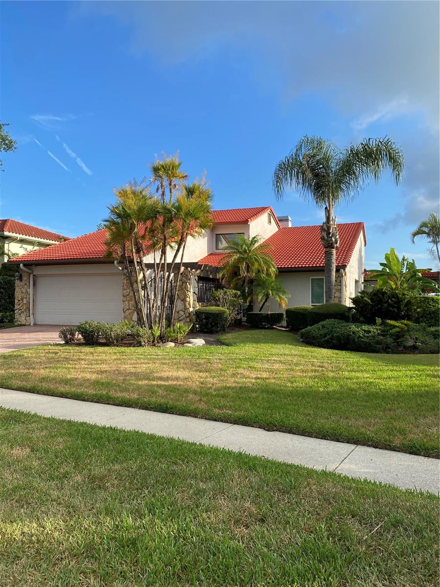 Waterfront Spanish style home with 5 Bedroom and 2.5bath with Master Bedroom downstairs. Kitchen with granite countertops, and beautiful pool and Patio with large concrete dock and boat lift. House was built in 1982 and is in excellent condition but dated. Has 2 car garage and big lot. Will be putting complete pictures and drone videos next week