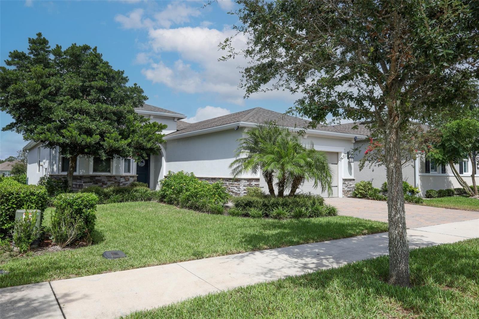 Welcome home to Victoria Park, a beautiful development in Deland, Florida, 25 minutes to Daytona Beach, 30 minutes to Orlando. Downtown Deland has a plentiful variety for dining and shopping, and is home to Stetson University. Residents in Victoria Park can enjoy the 18 hole golf course, 2 pools, 2 fitness centers, a Clubhouse with a restaurant and as a plus, a medical center, with doctors offices, an Imaging facility and a lab, all within the community. Also, restaurants, hair salon, wine bar, and other small businesses. This home is located in Victoria Hills, a friendly neighborhood , one of five villages within the Park. It has 2 bedrooms, plus den, great kitchen with granite countertops and cozy breakfast nook with bay windows; a formal dining room, huge primary bedroom, also with bay windows, an on-suite bathroom with 2 vanities, a large walk in shower and a huge walk in closet. The family room has triple sliding doors overlooking a private screened-in extended lanai with an open view of a calming pond. The den is perfect for an office, a tv room or could be converted to an extra bedroom. The laundry room has lots of storage with a closet, plus overhead cabinets. The HOA dues include new fiber optic streaming and 5 G internet, plus lawn irrigation