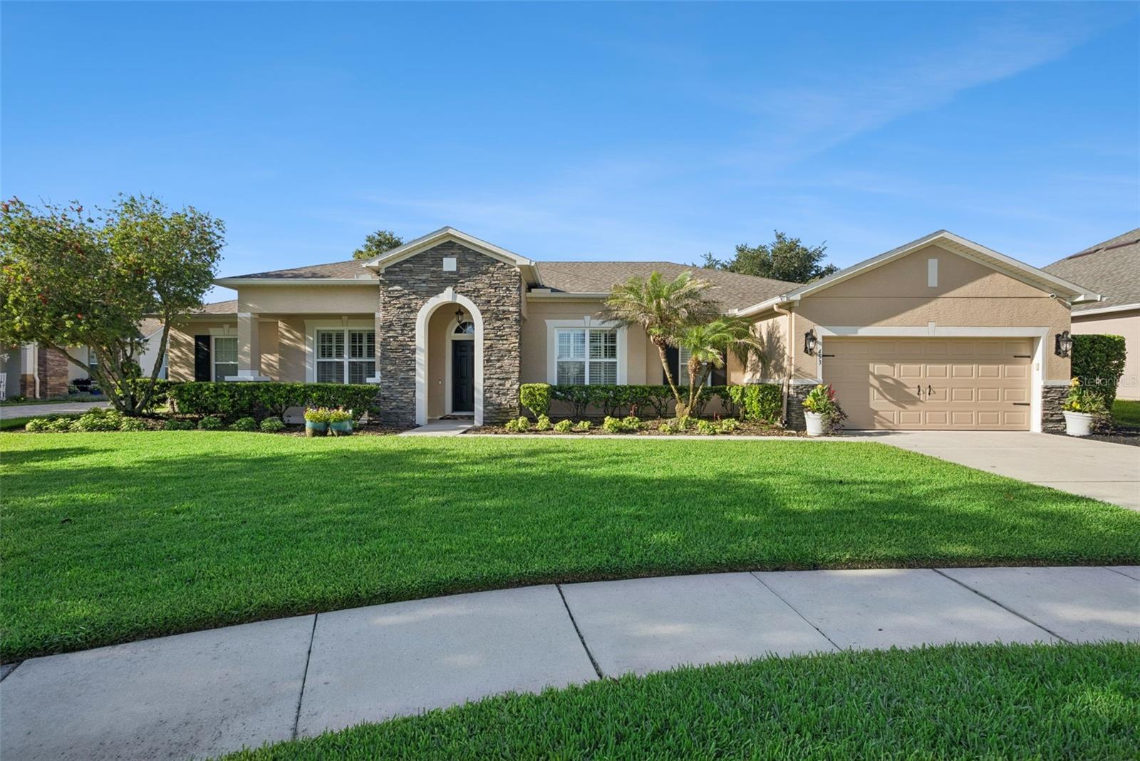 EXCEPTIONAL PRIDE OF OWNERSHIP - This is a truly special, single-owner home that has been cared for at a level rarely seen in the resale market. Welcome to 453 Torgiano Drive, a beautifully updated David Weekley home tucked near the back of guard-gated Westyn Bay in Ocoee. This thoughtfully designed single-story floor plan offers 4 bedrooms, 3 full bathrooms, a true 3-car tandem garage, a dedicated study, formal living and dining spaces, and an open kitchen, breakfast nook, and family room that create the perfect everyday gathering area. NO Carpet in the entire home - LVP, tile, and hardwoods throughout. The layout is one of the home’s greatest strengths, with a private primary suite separated from the secondary bedrooms, a two-bedroom guest wing on the opposite side of the home, and an additional bedroom near a full bath, laundry room, and garage access for excellent flexibility. The oversized primary suite feels like a true retreat, while the separate study provides an ideal home office without sacrificing a bedroom. Inside, the home has been thoughtfully updated throughout, including kitchen updates with solid wood cabinetry, granite countertops, a gas cooktop, attractive finishes, dual-pane windows finished with plantation shutters, and a NEW ROOF in 2021. The upgraded laundry room features custom cabinetry and an apron-front sink. Outside, enjoy a screened lanai, sparkling solar-heated pool, fenced backyard, peaceful views, and no rear neighbors. Westyn Bay offers guard-gated privacy, community pools, park space, and sports courts. Internet package is included in the HOA fee. You have West Orange Trail access minutes from your doorstep to get to Winter Garden's Plant Street. This is one of Orlando's most commuter-friendly locations - Winter Garden Village, Publix, SR-429, SR-408, the Turnpike, Orlando Health facilities, theme parks, and major employment corridors are easily accessible from this home. This is a rare combination of privacy, layout, updates, pool living, and West Orange convenience.