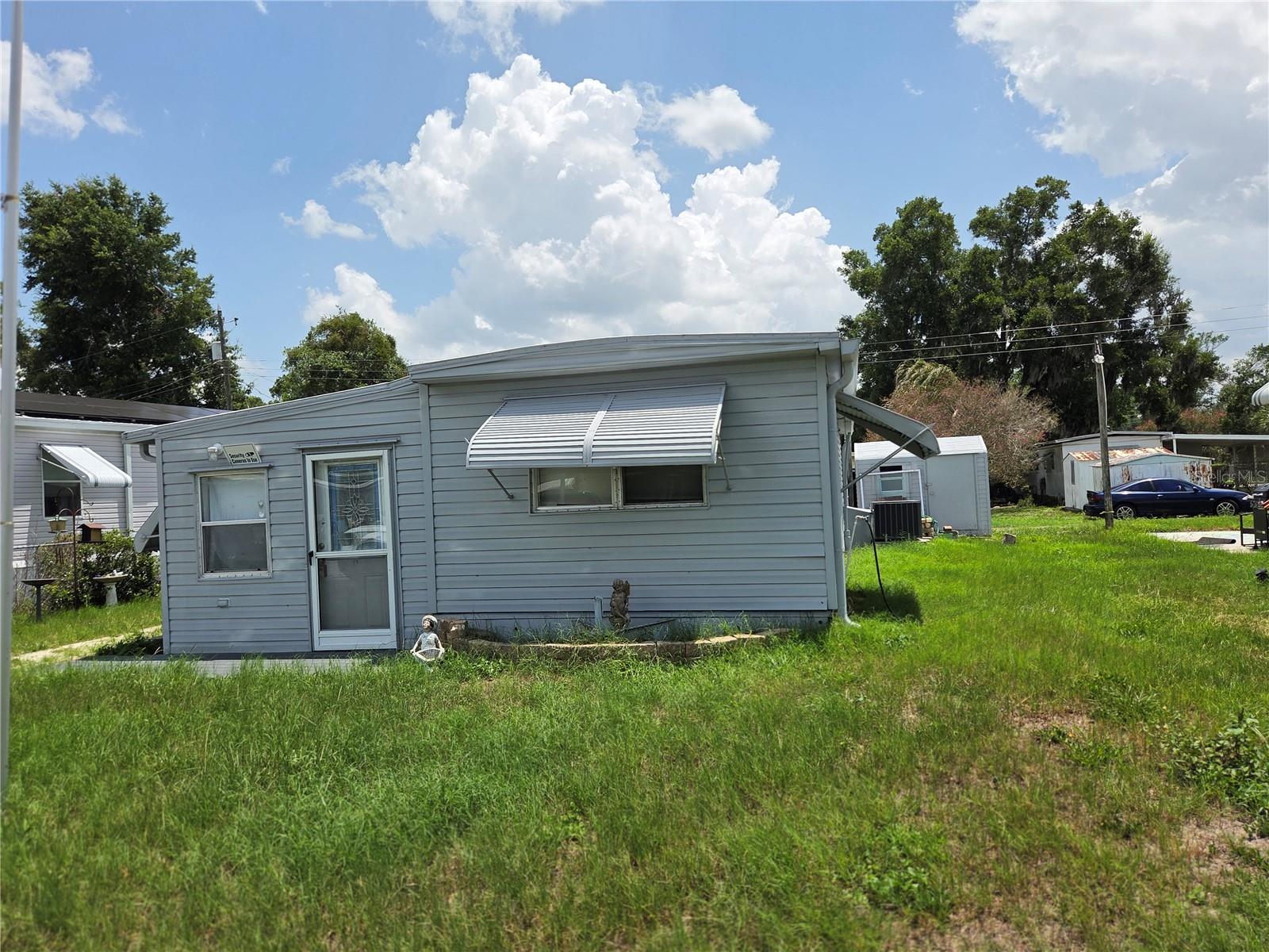 Revnoated 2 bedroom 2 bath with florida room and screened in porch.  Central heat and air. Has shed on the property.
